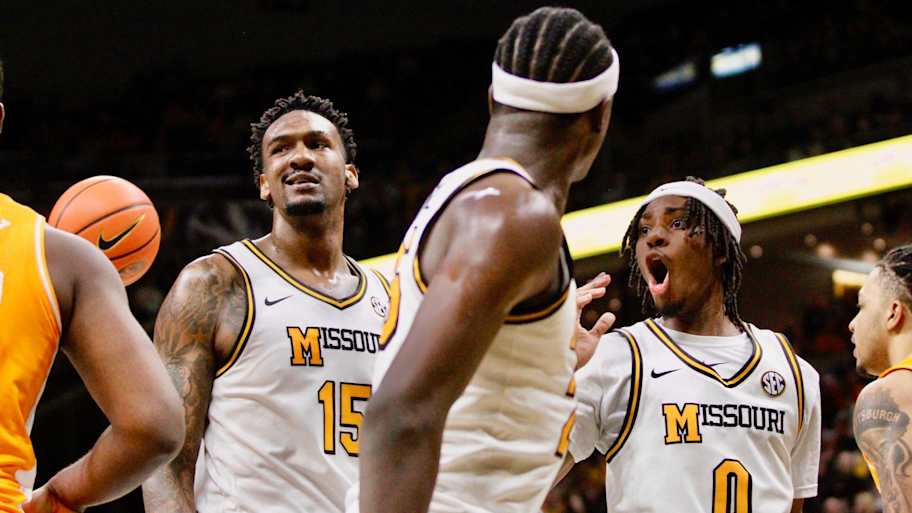 Feb 24, 2026; Columbia, Missouri, USA; Missouri Tigers guard Anthony Robinson II (0) and center Shawn Phillips Jr. (15) react