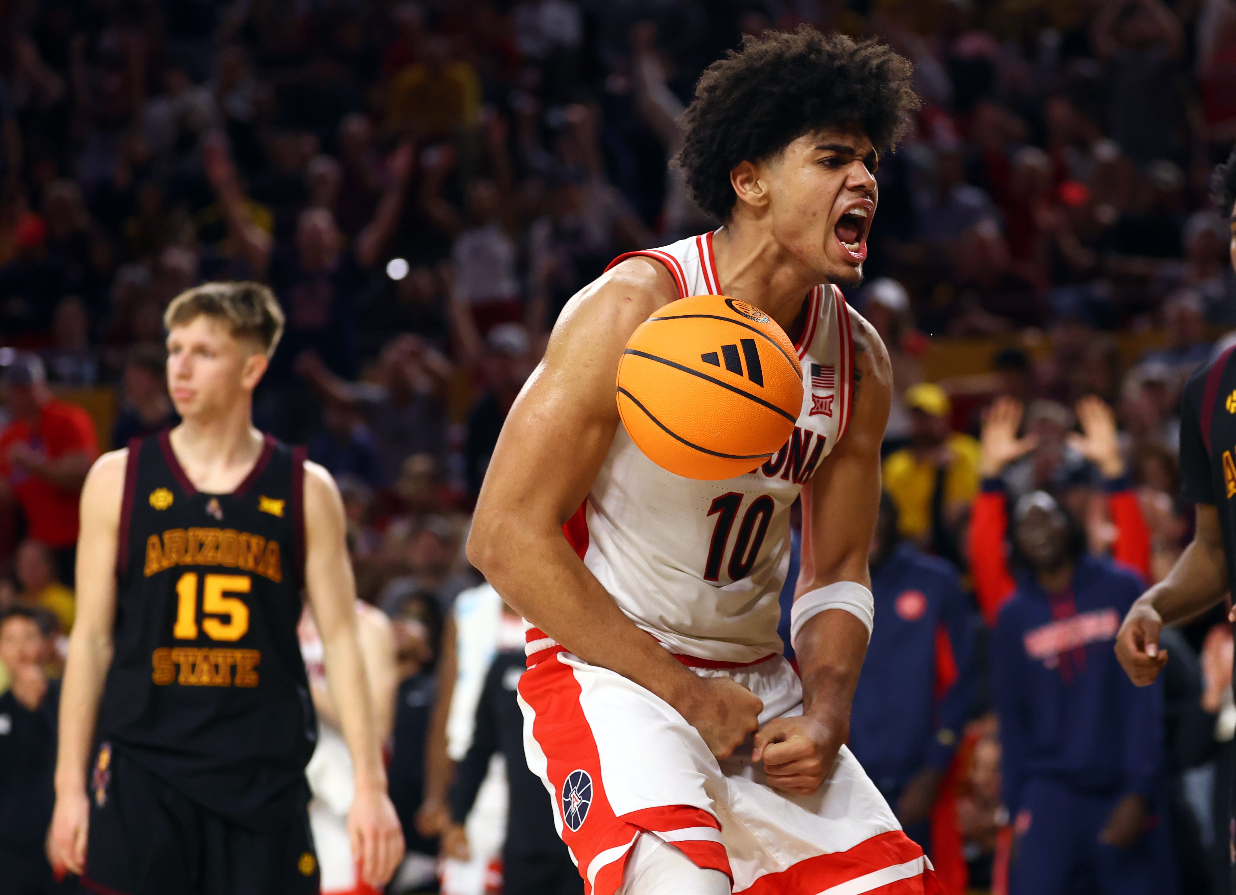 Jan 31, 2026; Tempe, Arizona, USA; Arizona Wildcats forward Koa Peat (10) celebrates against the Arizona State Sun Devils in the second half at Desert Financial Arena. Mandatory Credit: Mark J. Rebilas-Imagn Images