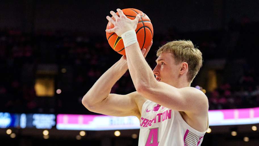 Creighton Bluejays guard Josh Dix (4) shoots the ball against the Connecticut Huskies during the second half.
