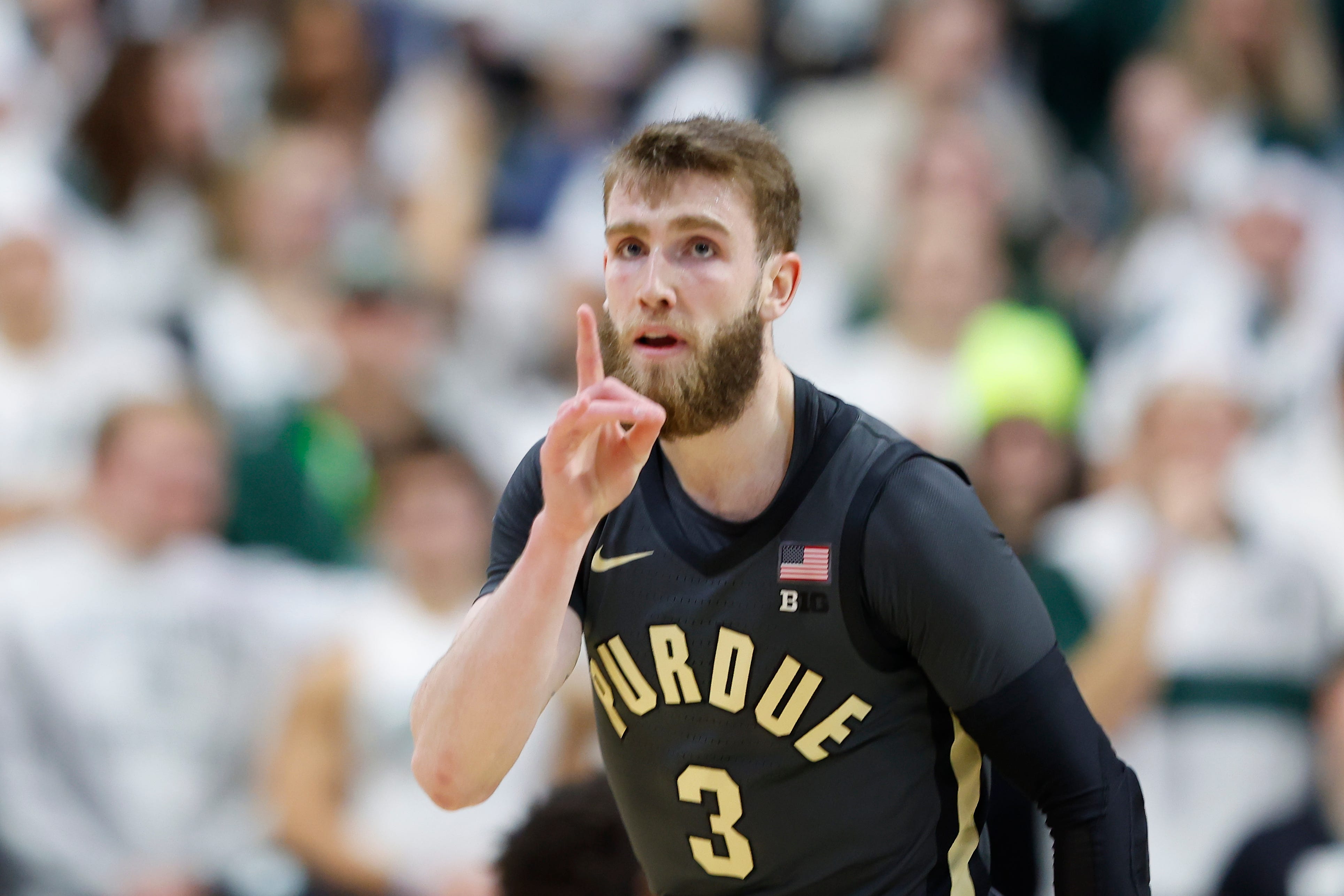 EAST LANSING, MICHIGAN - FEBRUARY 18: Braden Smith #3 of the Purdue Boilermakers reacts after making a basket during the first half against the Michigan State Spartans at Breslin Center on February 18, 2025 in East Lansing, Michigan. (Photo by Rey Del Rio/Getty Images)