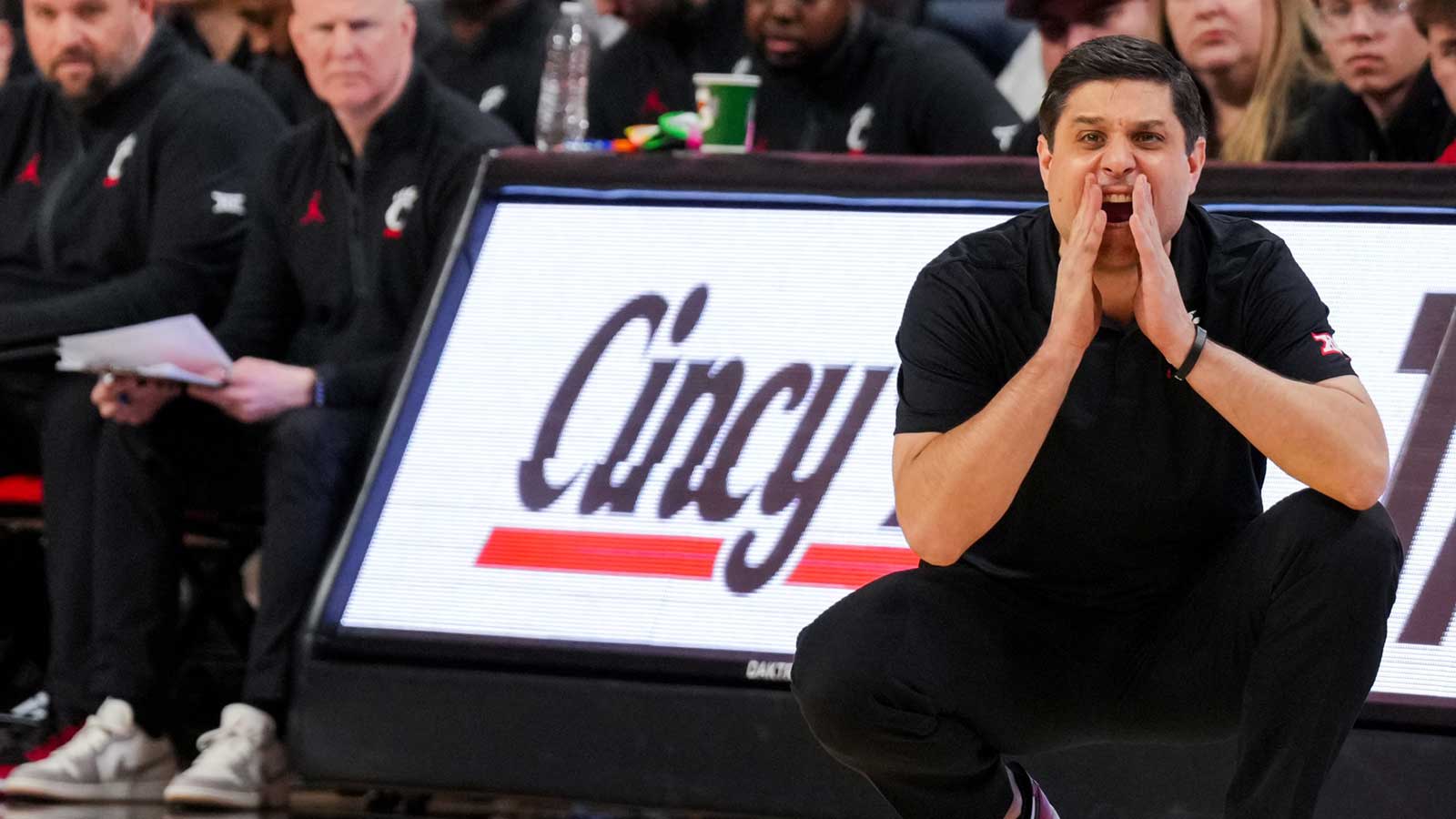 Cincinnati HC Wes Miller’s immediate reaction after upsetting Kansas