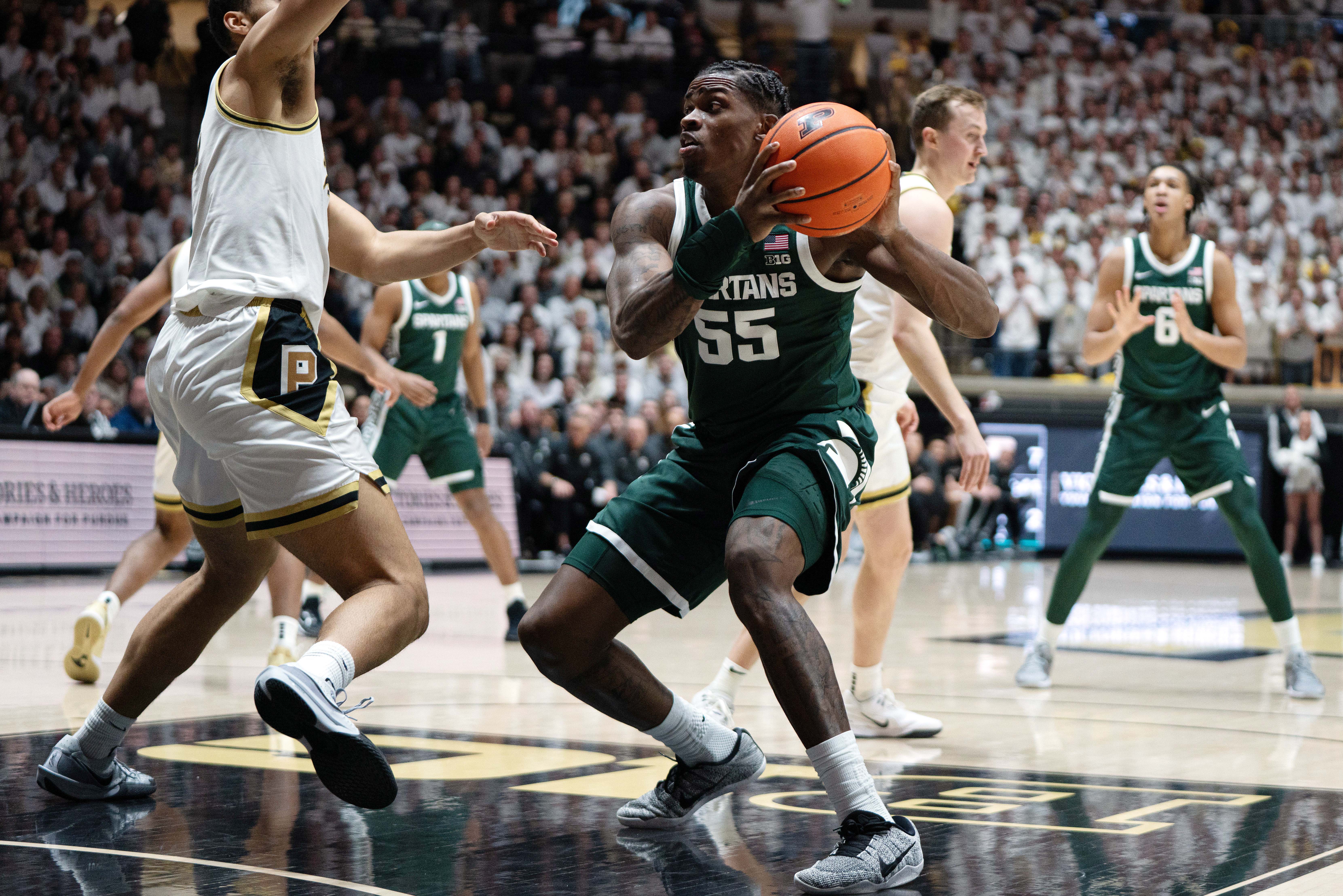Michigan State Spartans forward Coen Carr (55) looks to shoot the ball during the first half of a game against the Purdue Boilermakers at Mackey Arena in West Lafayette, Indiana, on Thursday, Feb. 26, 2026.