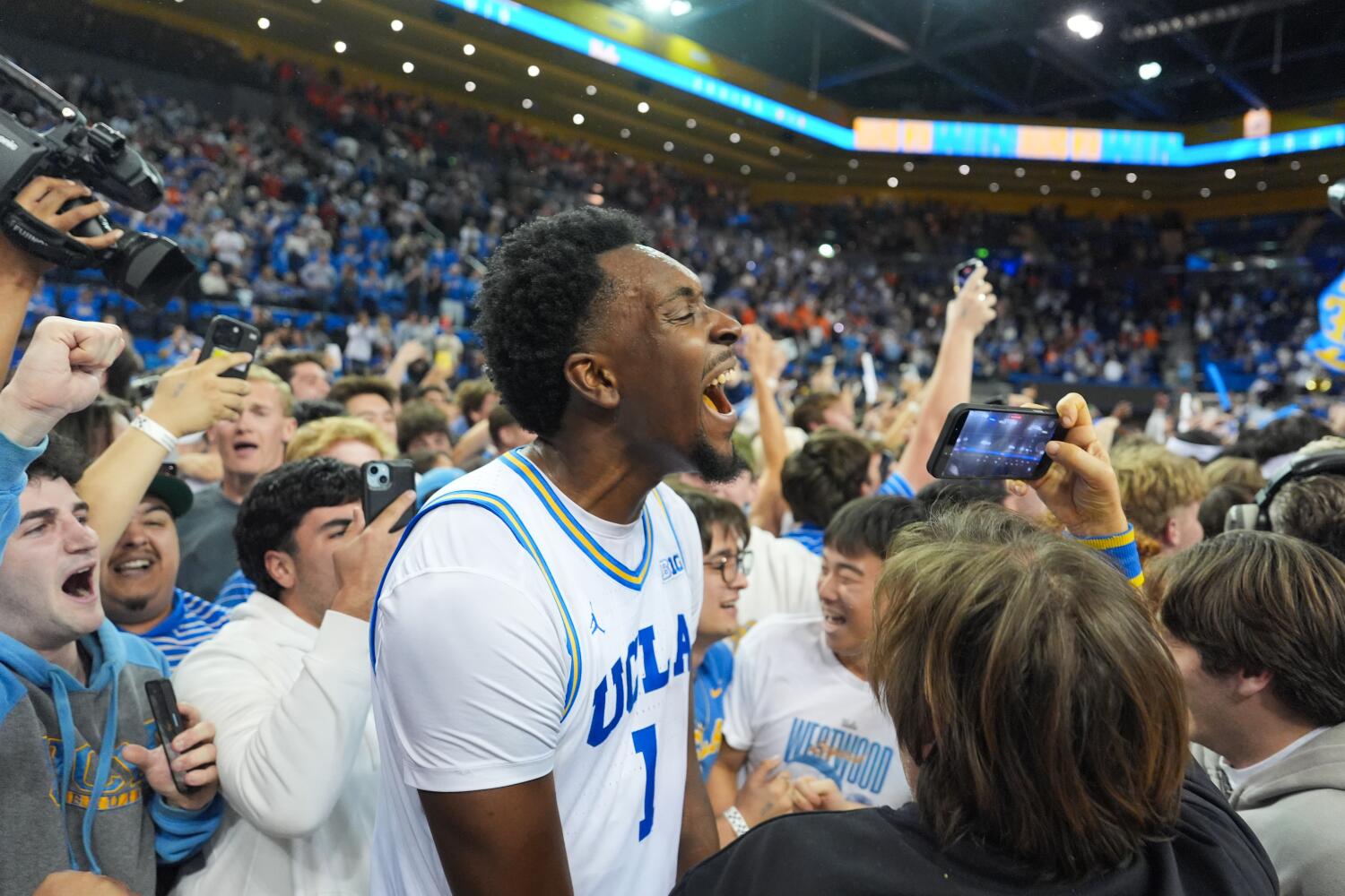 Donovan Dent channels Tyus Edney, lifts UCLA to stunning OT win over No. 10 Illinois