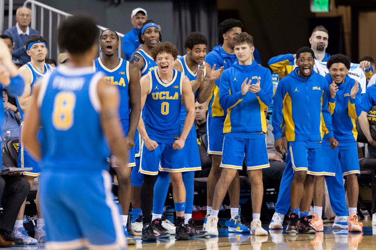 The UCLA Bruins bench celebrates a made three point shot by Eric Freeny #8 during an NCAA basketball game against the USC Trojans, Tuesday February 24, 2026 in Los Angeles, Calif. The UCLA Bruins bench celebrates a made three point shot by Eric Freeny #8 during an NCAA basketball game against the USC Trojans, Tuesday February 24, 2026 in Los Angeles, Calif.