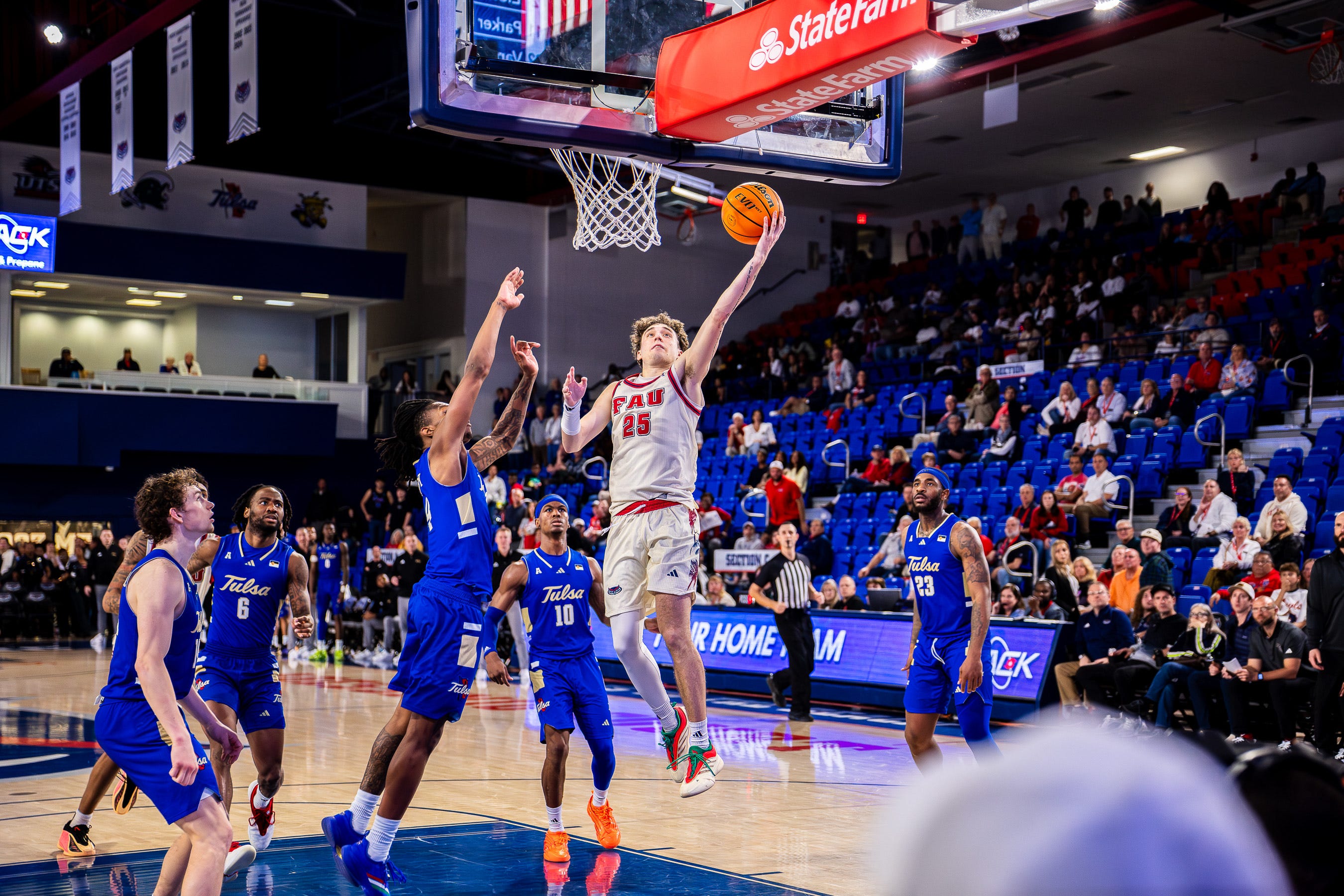 FAU junior guard Niccolo Moretti goes up for a layup and two of his career-high 25 points against Tulsa on Feb. 4 in Boca Raton.