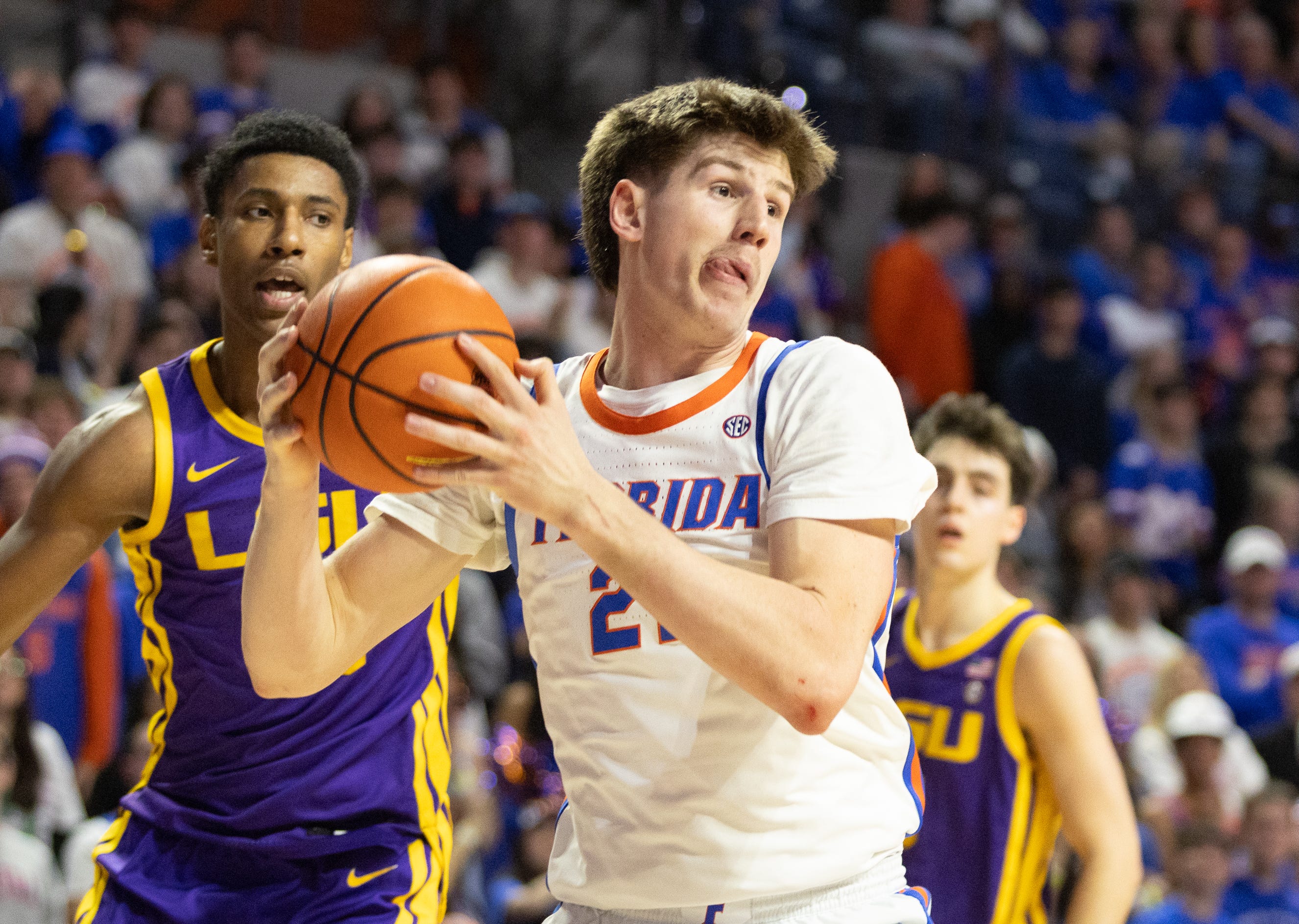 Florida forward Alex Condon (21) grabs the rebound during the first half of an NCAA mens basketball game at Steven C. O'Connell Center Exactek arena in Gainesville, FL on Tuesday, January 20, 2026. [Alan Youngblood/Gainesville Sun]