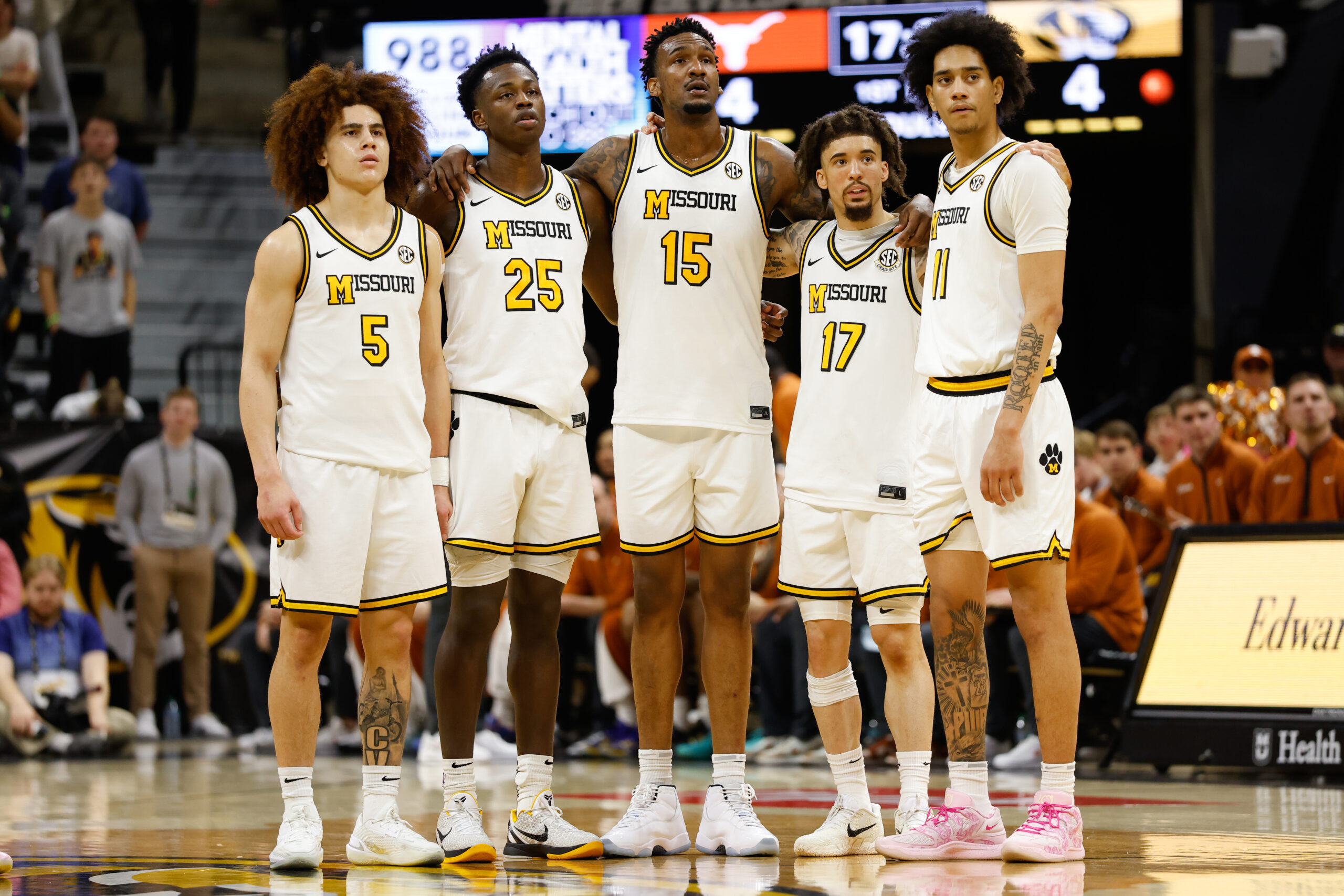 Foul trouble looms large for the Tigers as they fall to top-20 Arkansas 94-86