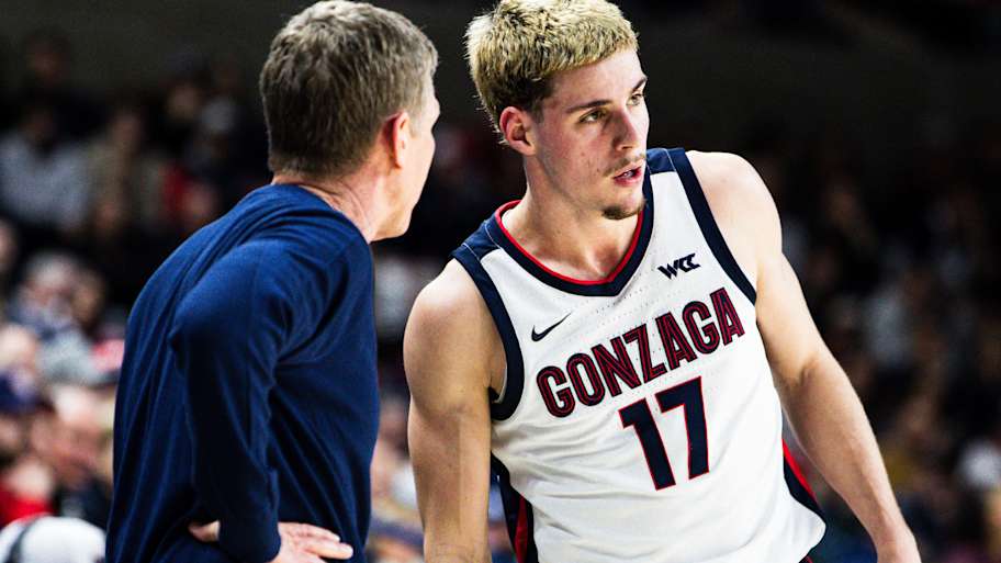 Gonzaga Bulldogs head coach Mark Few and guard Mario Saint-Supery (17).