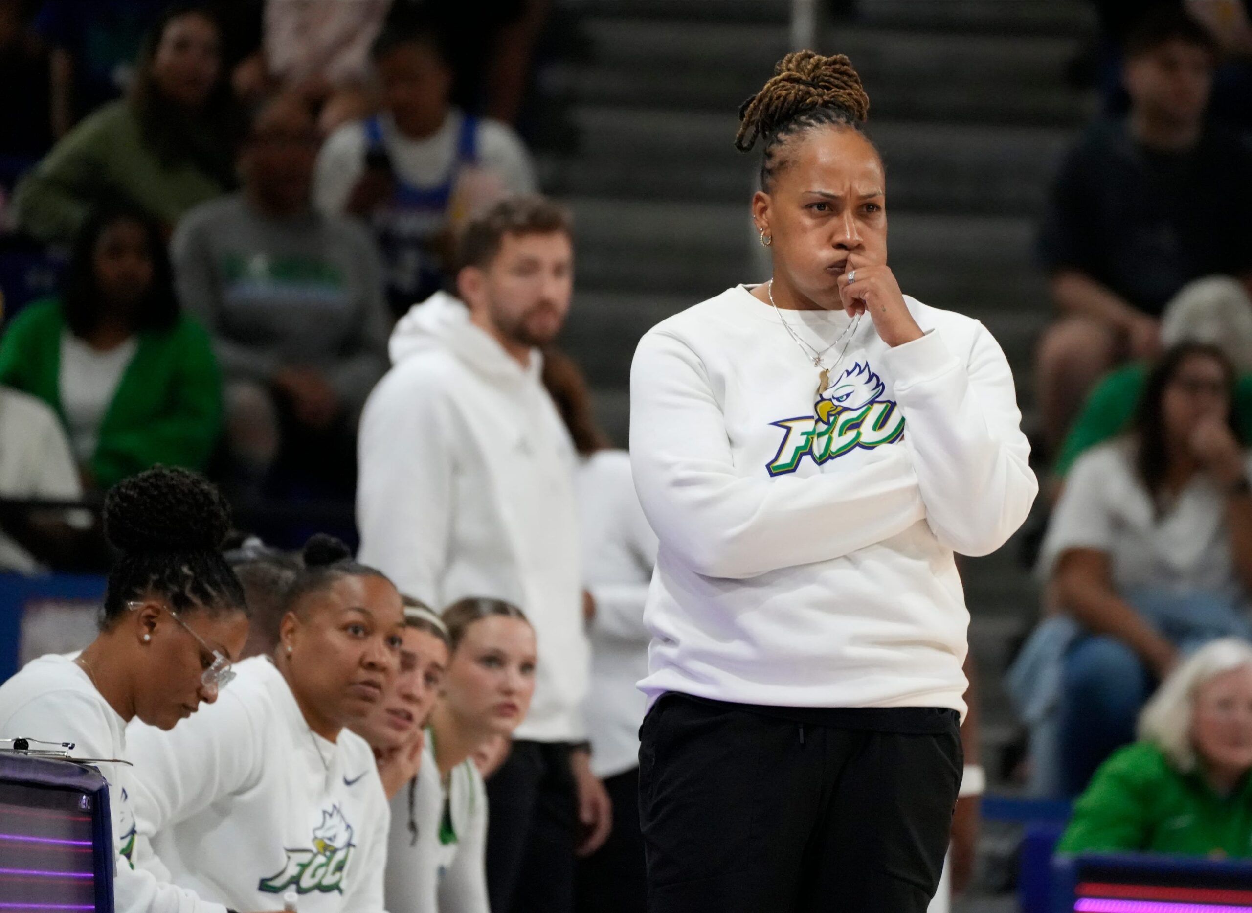 How are the FGCU men's and women's basketball programs faring thus far?