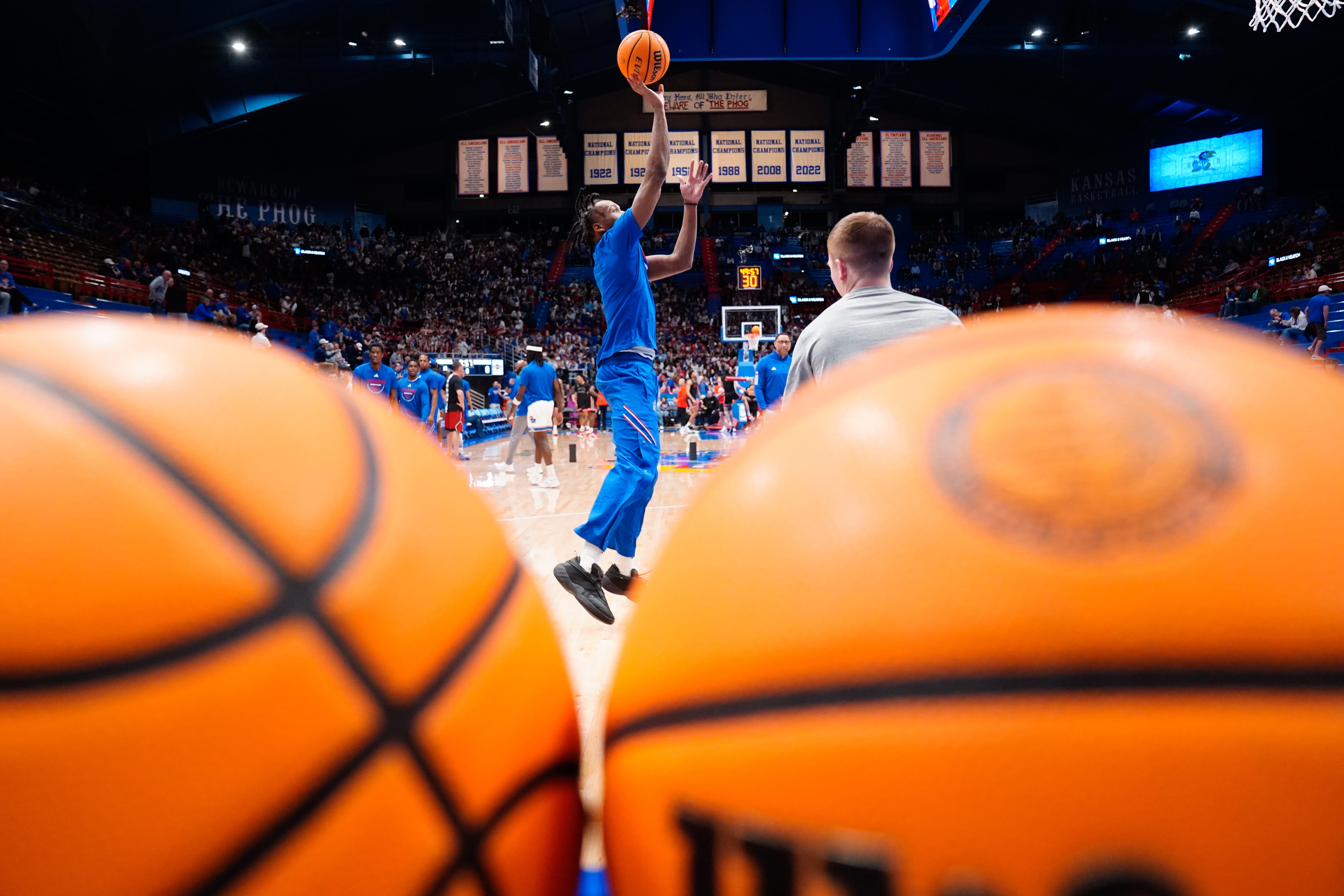 Kansas basketball guard Darryn Peterson (22) warms up before taking on Houston for a game inside Allen Fieldhouse on Feb. 23, 2026.