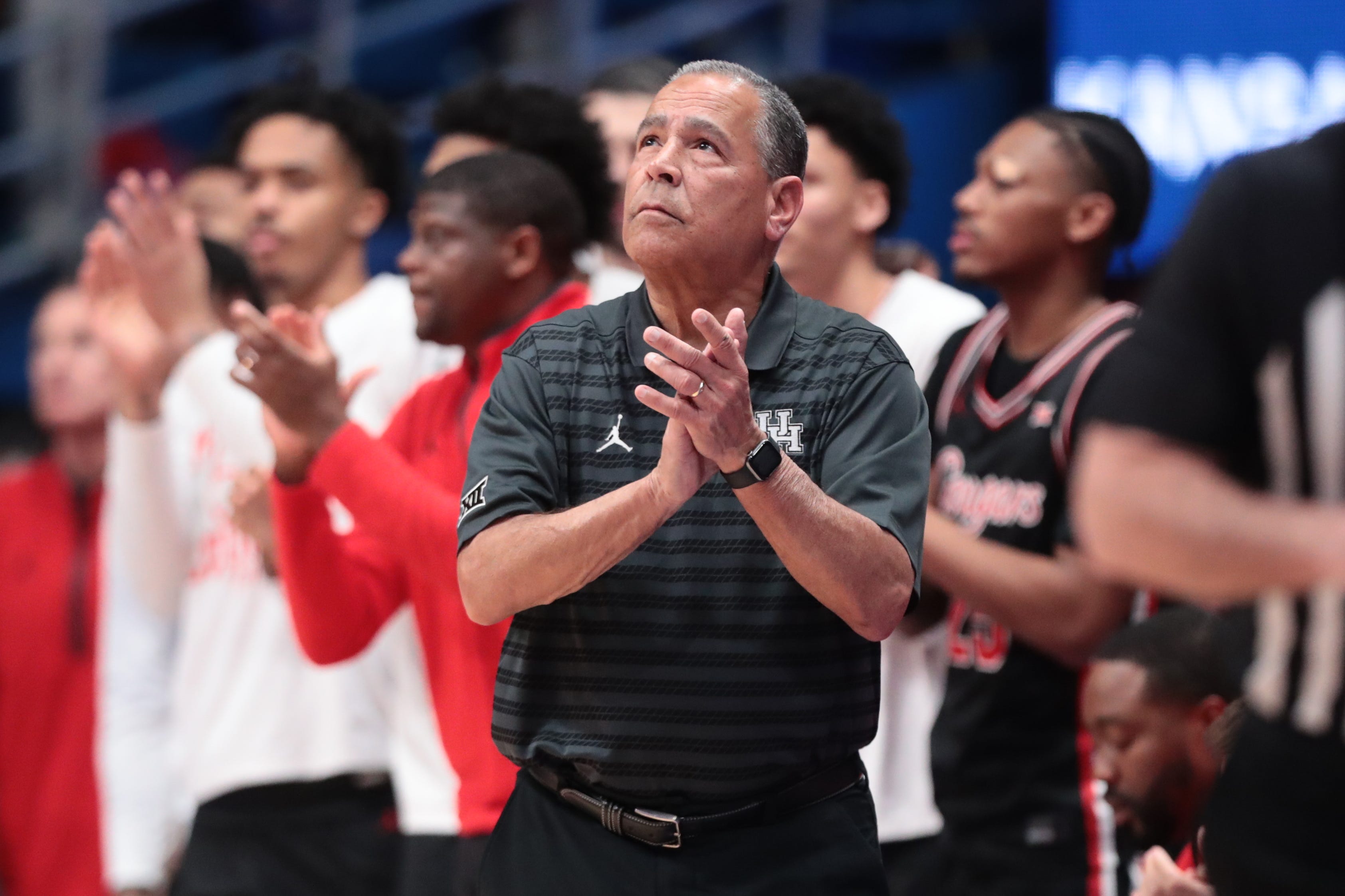 Houston basketball coach Kelvin Sampson applauds a play against Kansas during a game inside Allen Fieldhouse on Feb. 23, 2026.