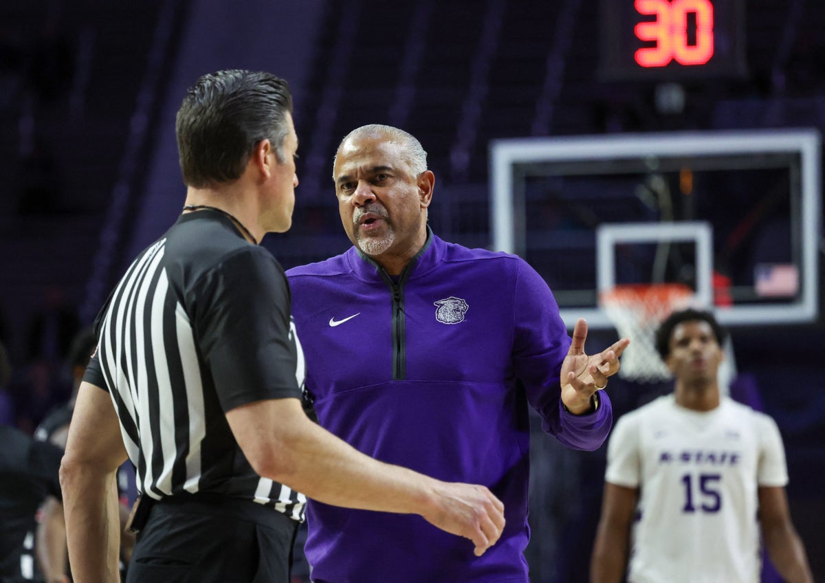Kansas State basketball coach fired after fans wore bags over their heads in protest
