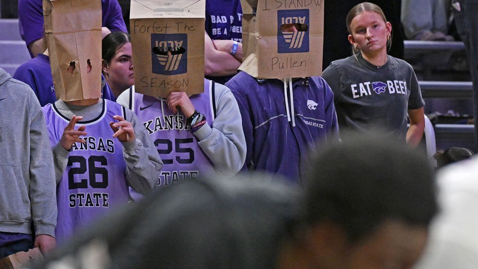 Kansas State’s firing of its men’s basketball coach is the latest example of schools writing checks they don’t want to cash