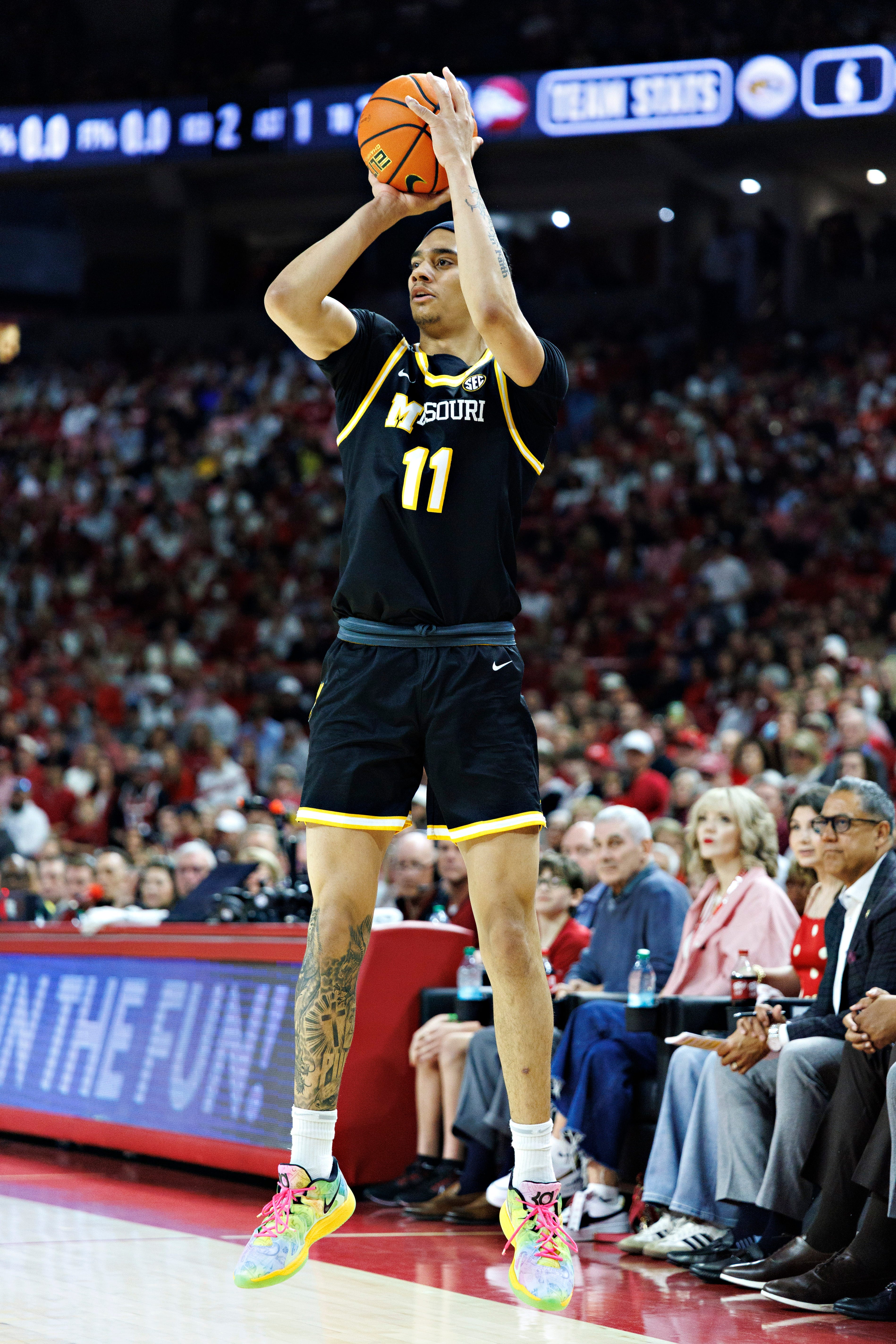 FAYETTEVILLE, ARKANSAS - FEBRUARY 21: Trent Pierce #11 of the Missouri Tigers shoots a three-point shot in the first half during the game against the Arkansas Razorbacks Walton Arena on February 21, 2026 in Fayetteville, Arkansas. (Photo by Wesley Hitt/Getty Images)
