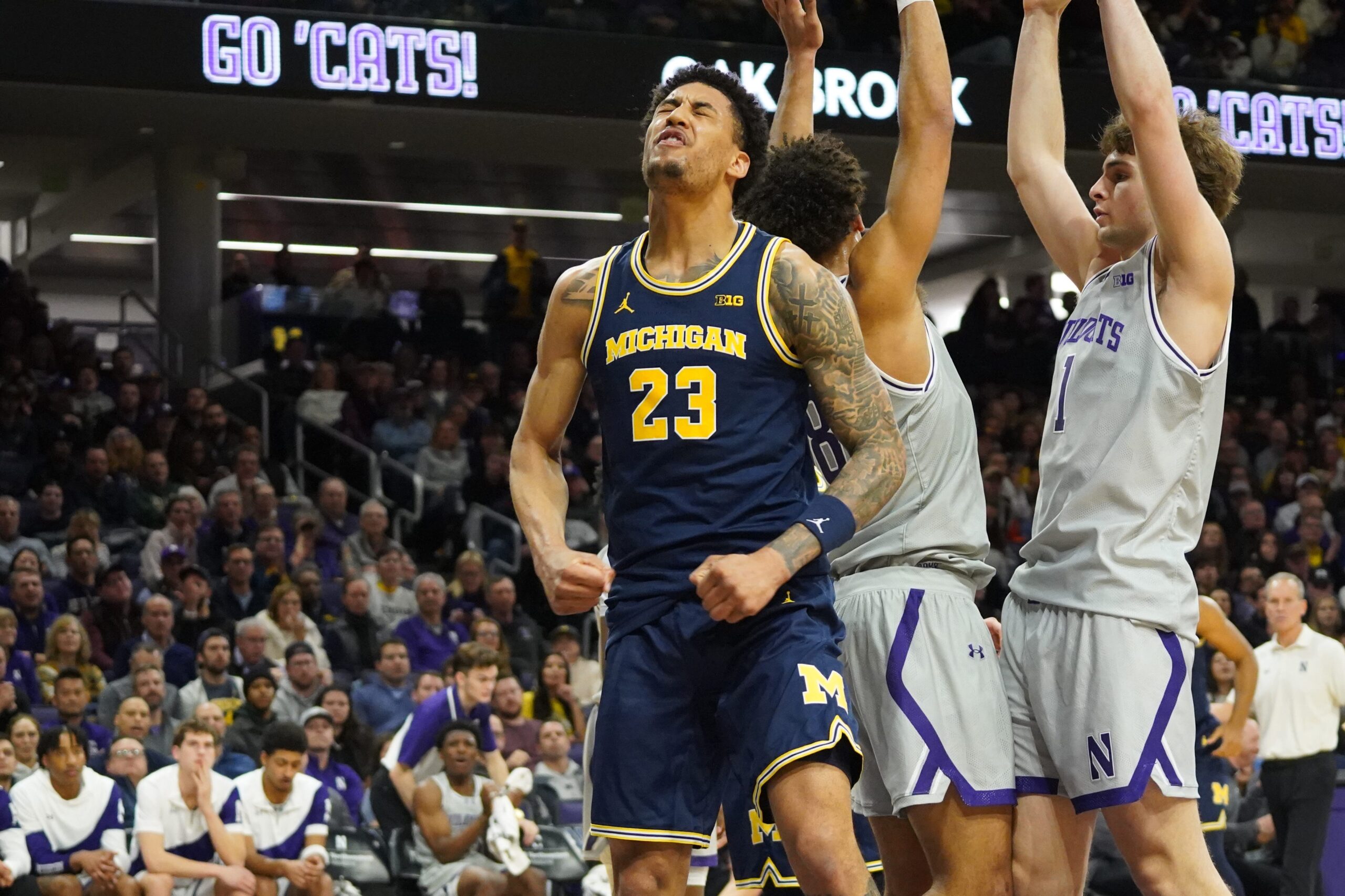 Michigan averts disaster, erupts late in 87-75 win vs Northwestern