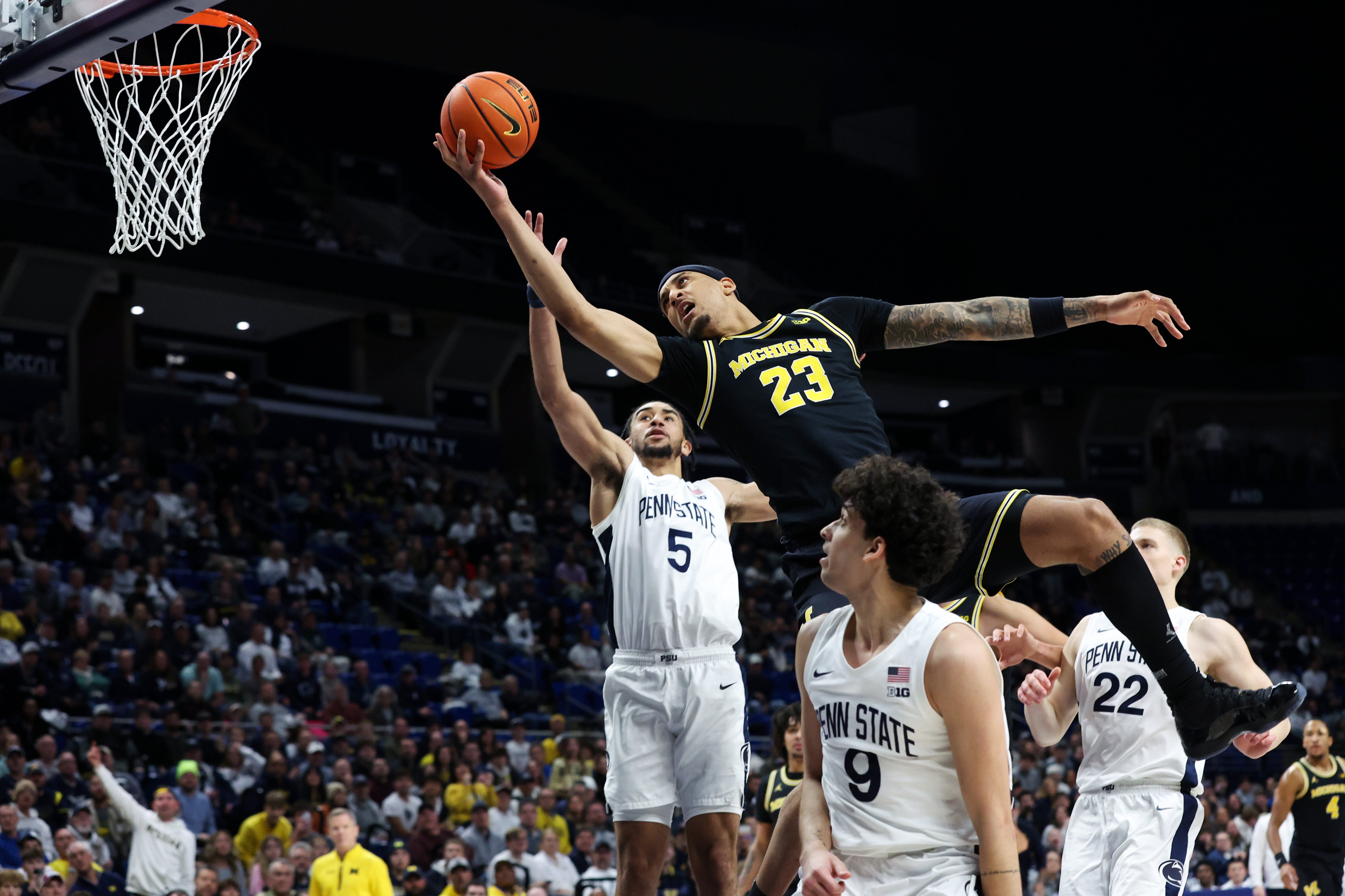 Jan 6, 2026; University Park, Pennsylvania, USA; Michigan Wolverines forward Yaxel Lendeborg (23) drives the ball to the basket during the second half against the Penn State Nittany Lions at Bryce Jordan Center. Mandatory Credit: Matthew O'Haren-Imagn Images
