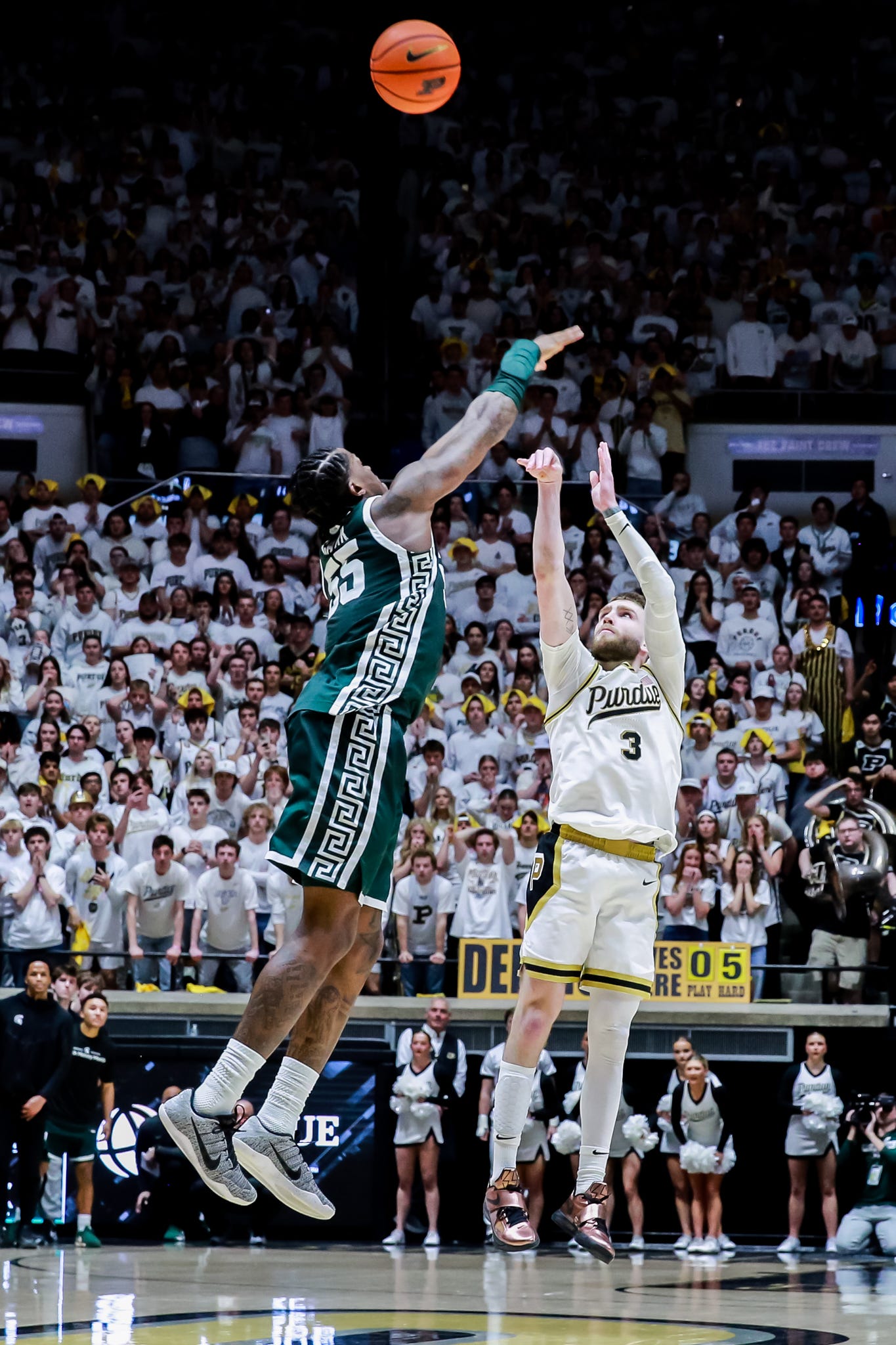 Michigan State Spartans forward Coen Carr goes out on defense on Purdue Boilermakers guard Braden Smith at Mackey Arena in West Lafayette, Indiana, on Thursday, Feb. 26, 2026.