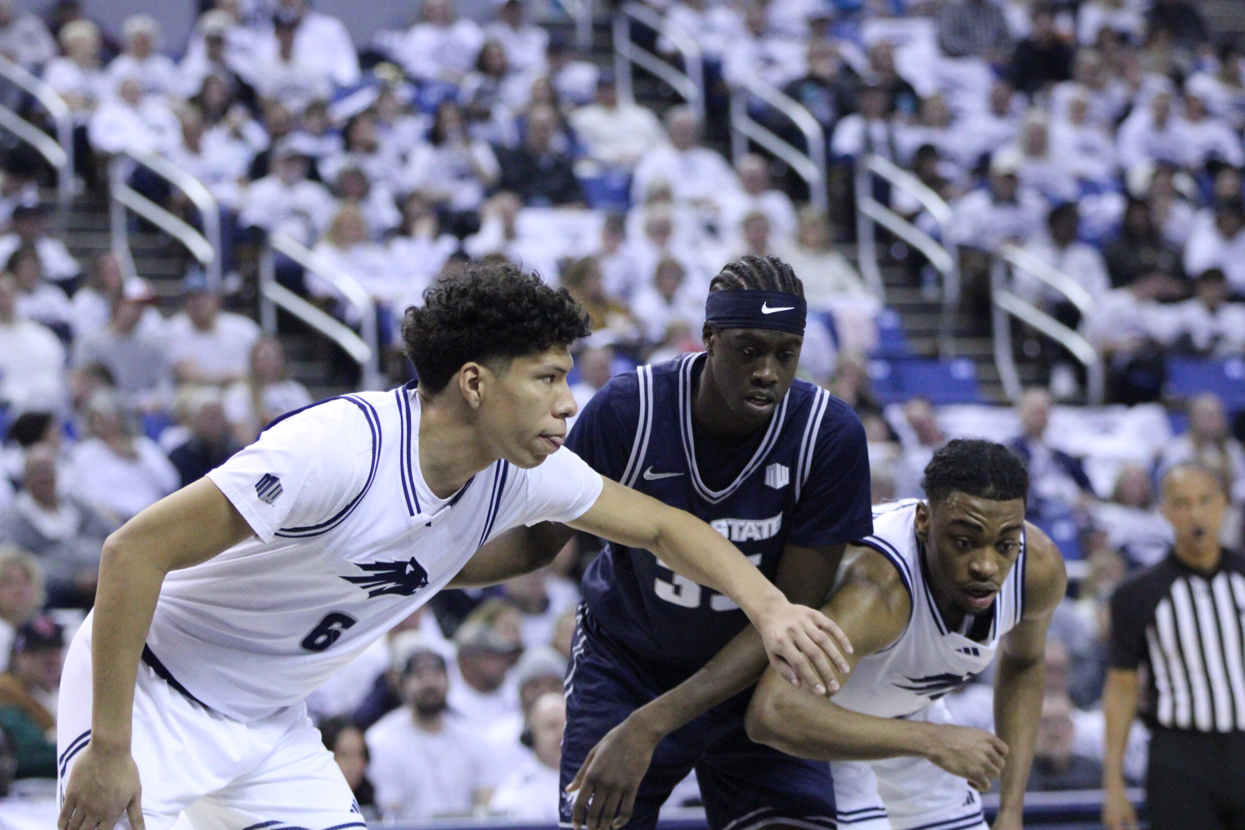 Nevada bounces back, shocks Utah State 80-77 in late Mountain West classic