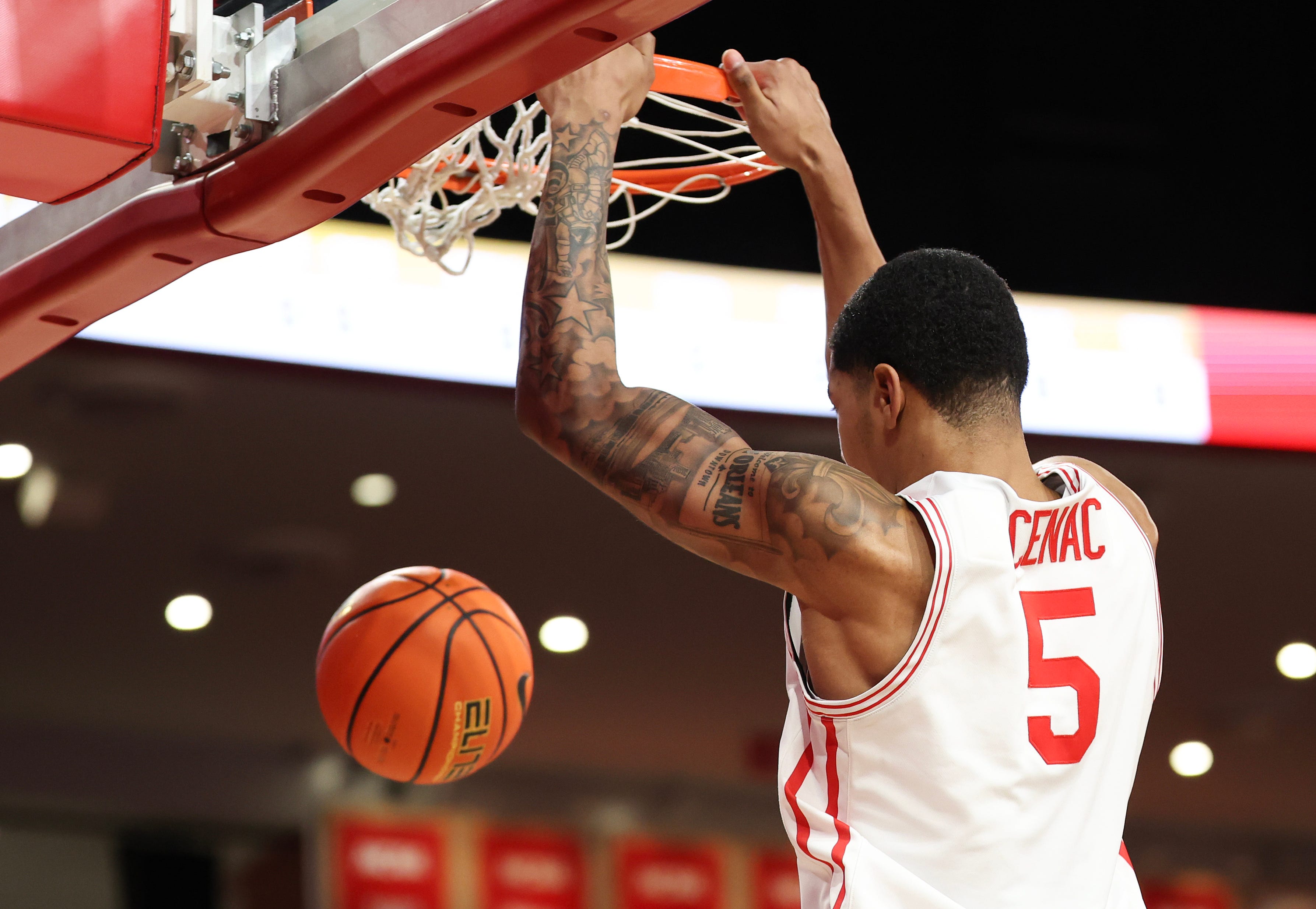 Feb 4, 2026; Houston, Texas, USA; Houston Cougars center Chris Cenac Jr. (5) dunks against the UCF Knights in the first half at Fertitta Center. Mandatory Credit: Thomas Shea-Imagn Images