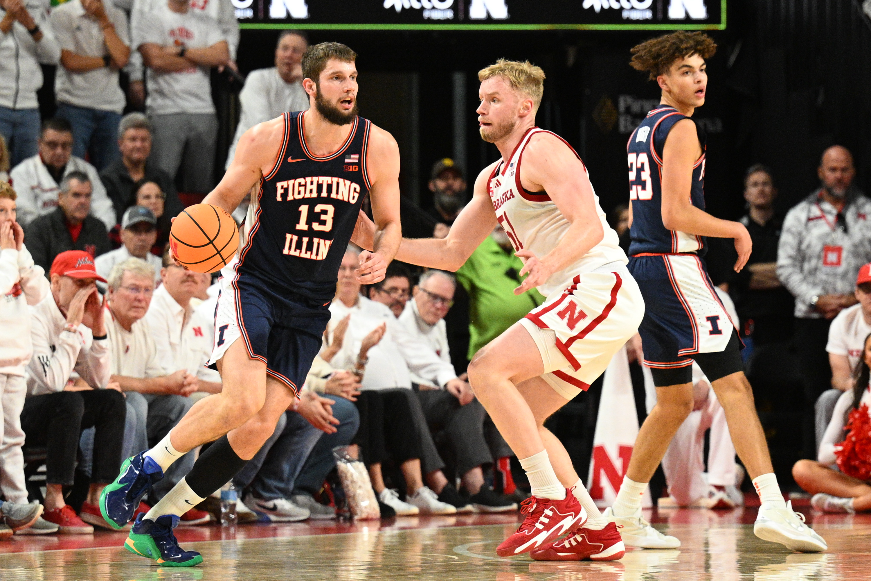 LINCOLN, NEBRASKA - FEBRUARY 1: Tomislav Ivisic #13 of the Illinois Fighting Illini dribbles against Rienk Mast #51 of the Nebraska Cornhuskers during the first half at Pinnacle Bank Arena on February 1, 2026 in Lincoln, Nebraska.  (Photo by Steven Branscombe/Getty Images)