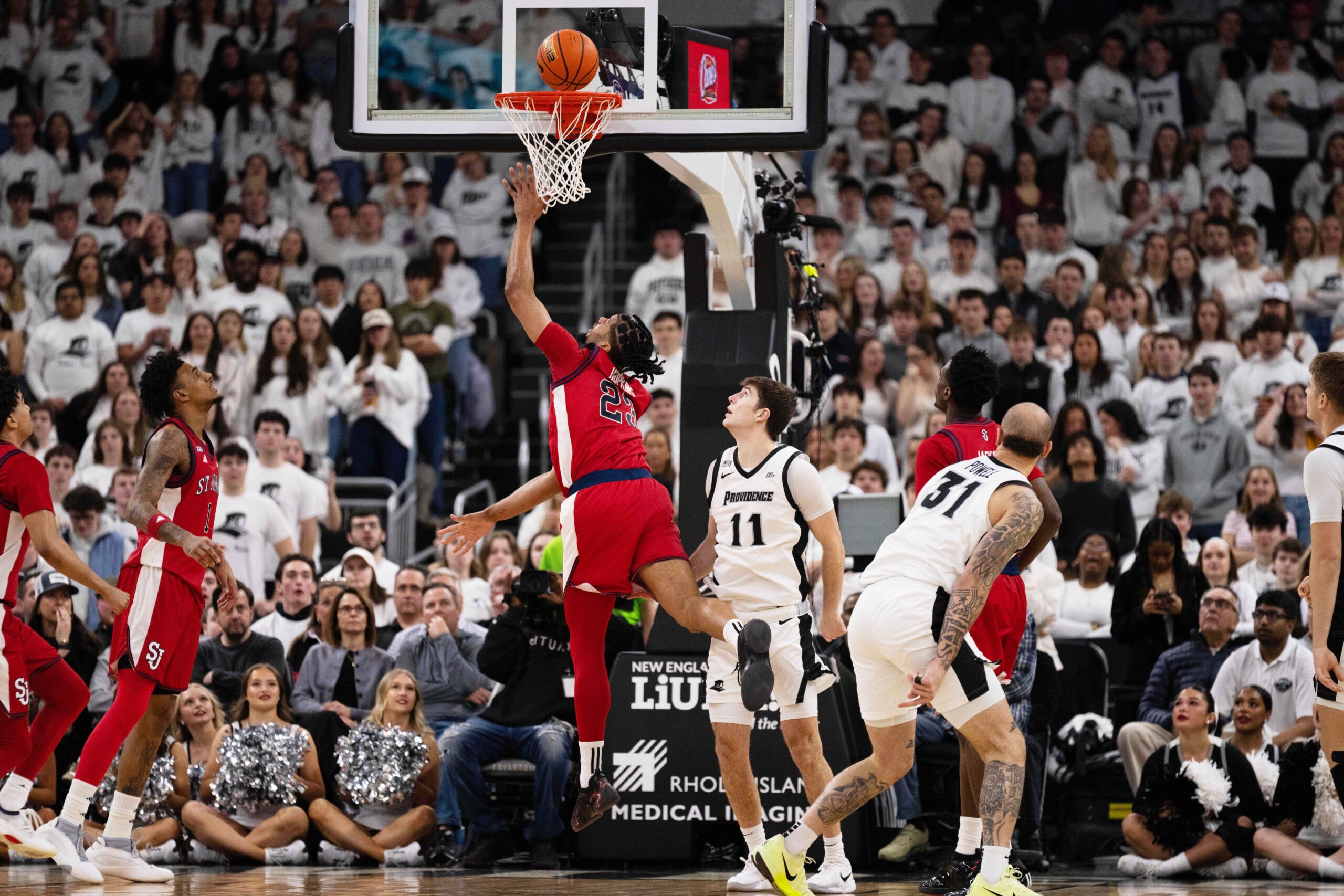 Seven ejected in PC-St. John's game after foul on ex-Friars star Bryce Hopkins