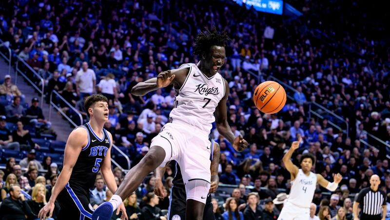 UCF center John Bol (7) yells after a dunk during game against BYU, Tuesday, Feb. 24, 2026, in Provo, Utah.