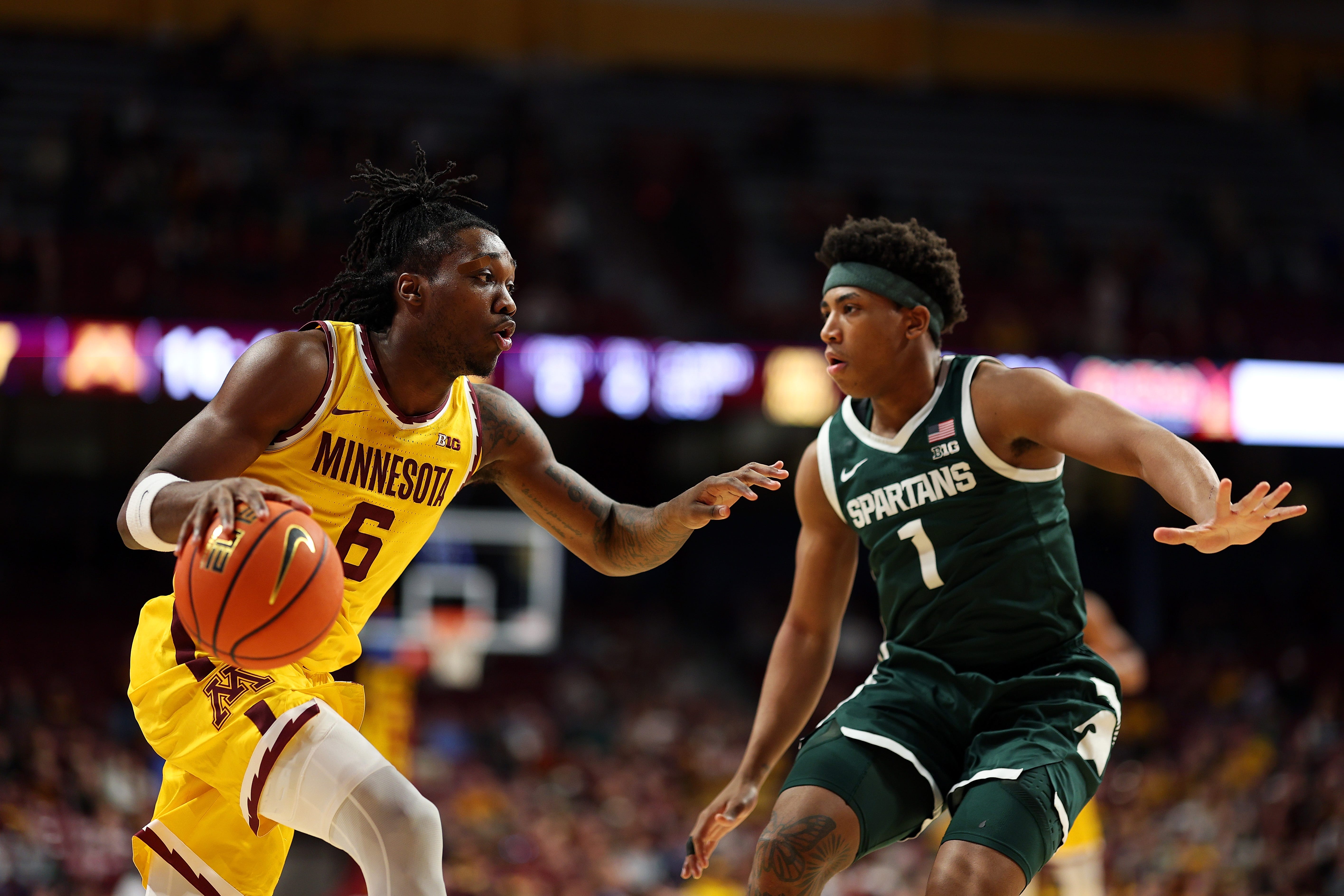 MINNEAPOLIS, MINNESOTA - FEBRUARY 04: Langston Reynolds #6 of the Minnesota Golden Gophers drives to the basket against Jeremy Fears Jr. #1 of the Michigan State Spartans in the first half at Williams Arena on February 04, 2026 in Minneapolis, Minnesota. (Photo by David Berding/Getty Images)