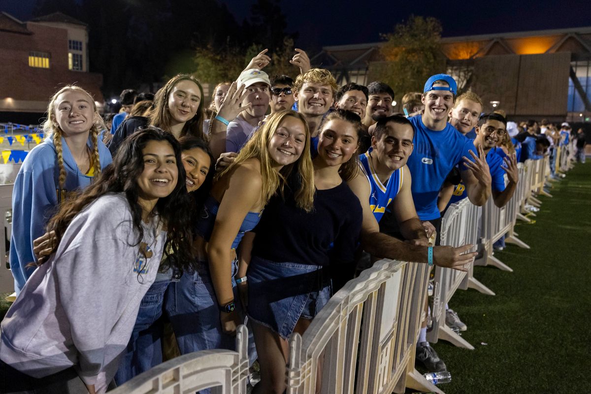 UCLA students line up outside Pauley Pavilion for a chance to get a seat in the Den student section before an NCAA basketball game against the USC Trojans, Tuesday February 24, 2026 in Los Angeles, Calif. UCLA students line up outside Pauley Pavilion for a chance to get a seat in the Den student section before an NCAA basketball game against the USC Trojans, Tuesday February 24, 2026 in Los Angeles, Calif.