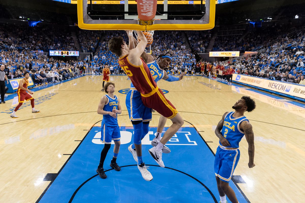 Gabe Dynes #45 of the USC Trojans dunks the ball over Steven Jamerson II #24 of the UCLA Bruins during an NCAA basketball game, Tuesday February 24, 2026 in Los Angeles, Calif. Gabe Dynes #45 of the USC Trojans dunks the ball over Steven Jamerson II #24 of the UCLA Bruins during an NCAA basketball game, Tuesday February 24, 2026 in Los Angeles, Calif.