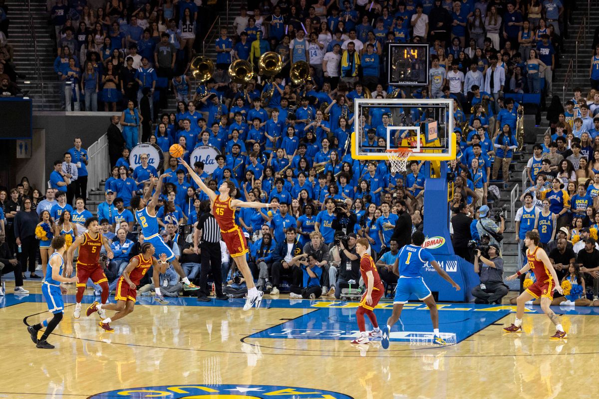 Donovan Dent #2 of the UCLA Bruins hits a shot at the halftime buzzer during an NCAA basketball game against the USC Trojans, Tuesday February 24, 2026 in Los Angeles, Calif. Donovan Dent #2 of the UCLA Bruins hits a shot at the halftime buzzer during an NCAA basketball game against the USC Trojans, Tuesday February 24, 2026 in Los Angeles, Calif.