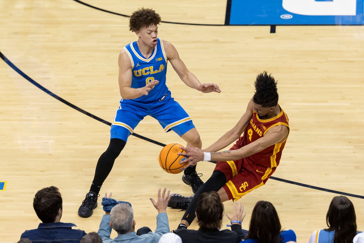 Chad Baker-Mazara #4 of the USC Trojans tries to save the ball during an NCAA basketball game against the UCLA Bruins, Tuesday February 24, 2026 in Los Angeles, Calif. Chad Baker-Mazara #4 of the USC Trojans tries to save the ball during an NCAA basketball game against the UCLA Bruins, Tuesday February 24, 2026 in Los Angeles, Calif.