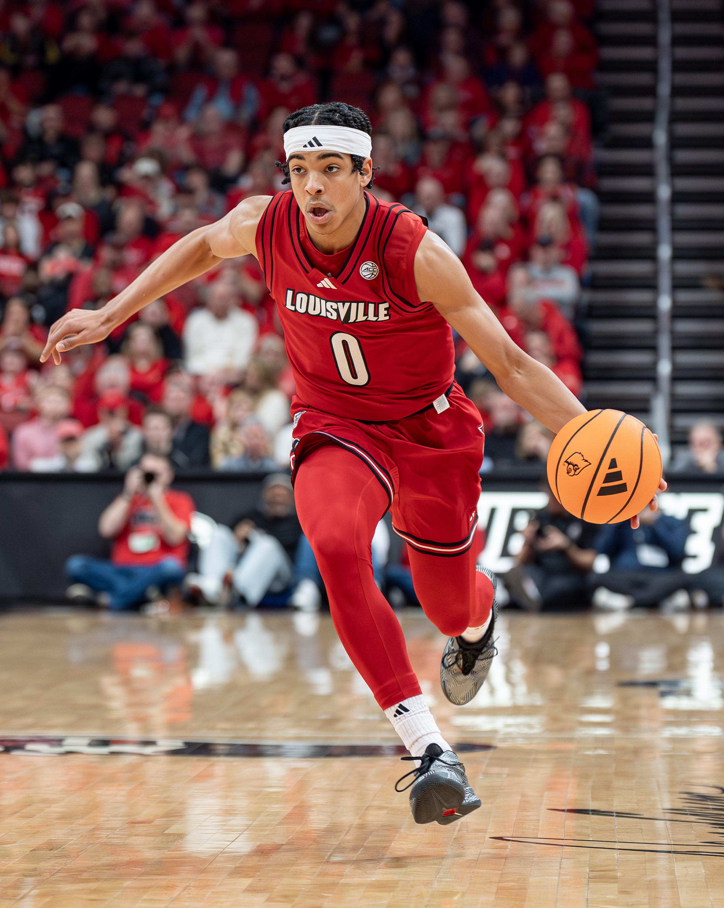 Louisville Cardinals guard Mikel Brown Jr. (0) drives to the basket as the Louisville Cardinals host the Georgia Tech Yellow Jackets in an NCAA basketball game at the KFC Yum! Center, Saturday, Feb. 21, 2026, in Louisville.