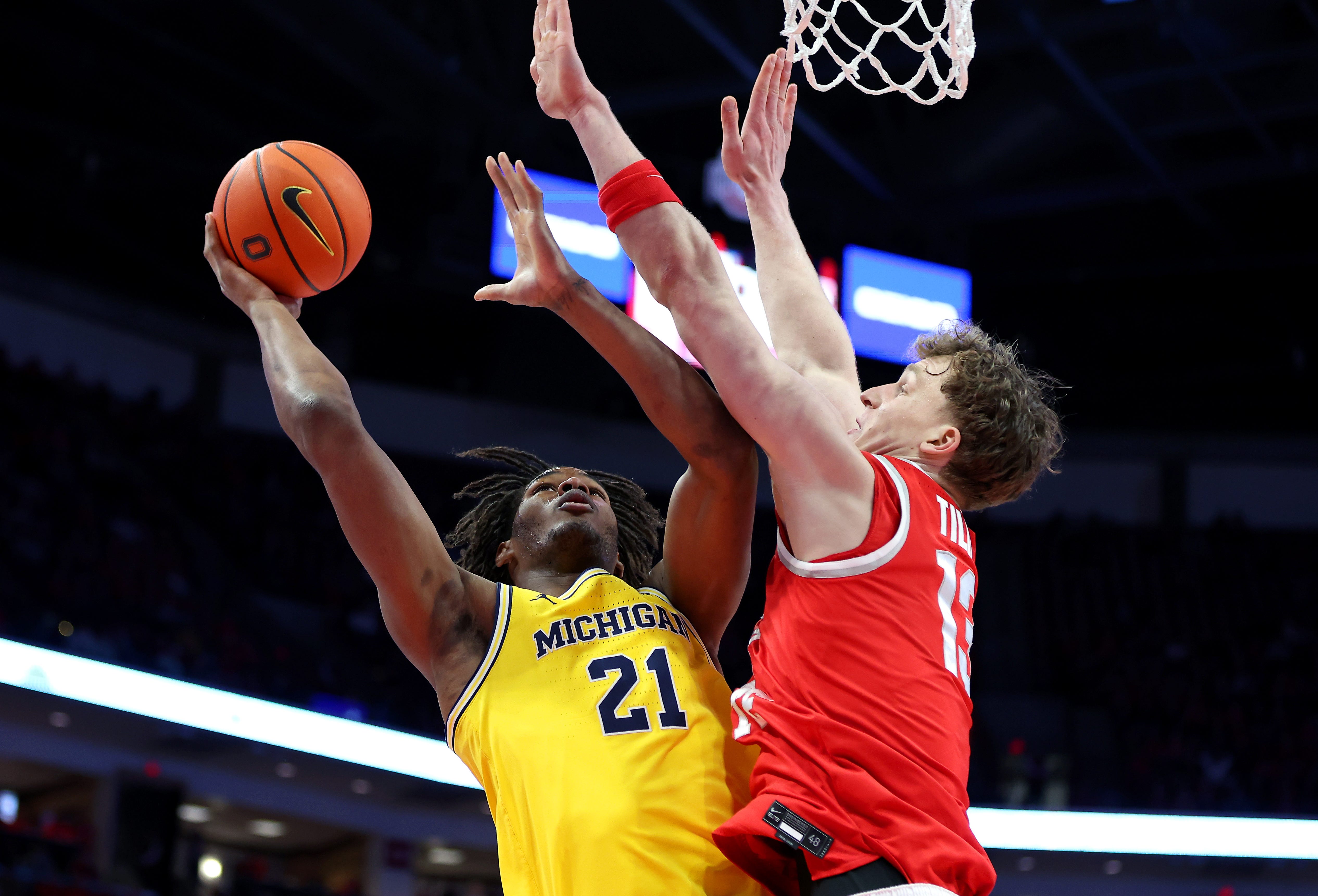 Michigan Wolverines forward Morez Johnson Jr. drives to the basket as Ohio State Buckeyes center Christoph Tilly defends during the first half at Value City Arena, Feb. 8, 2026.