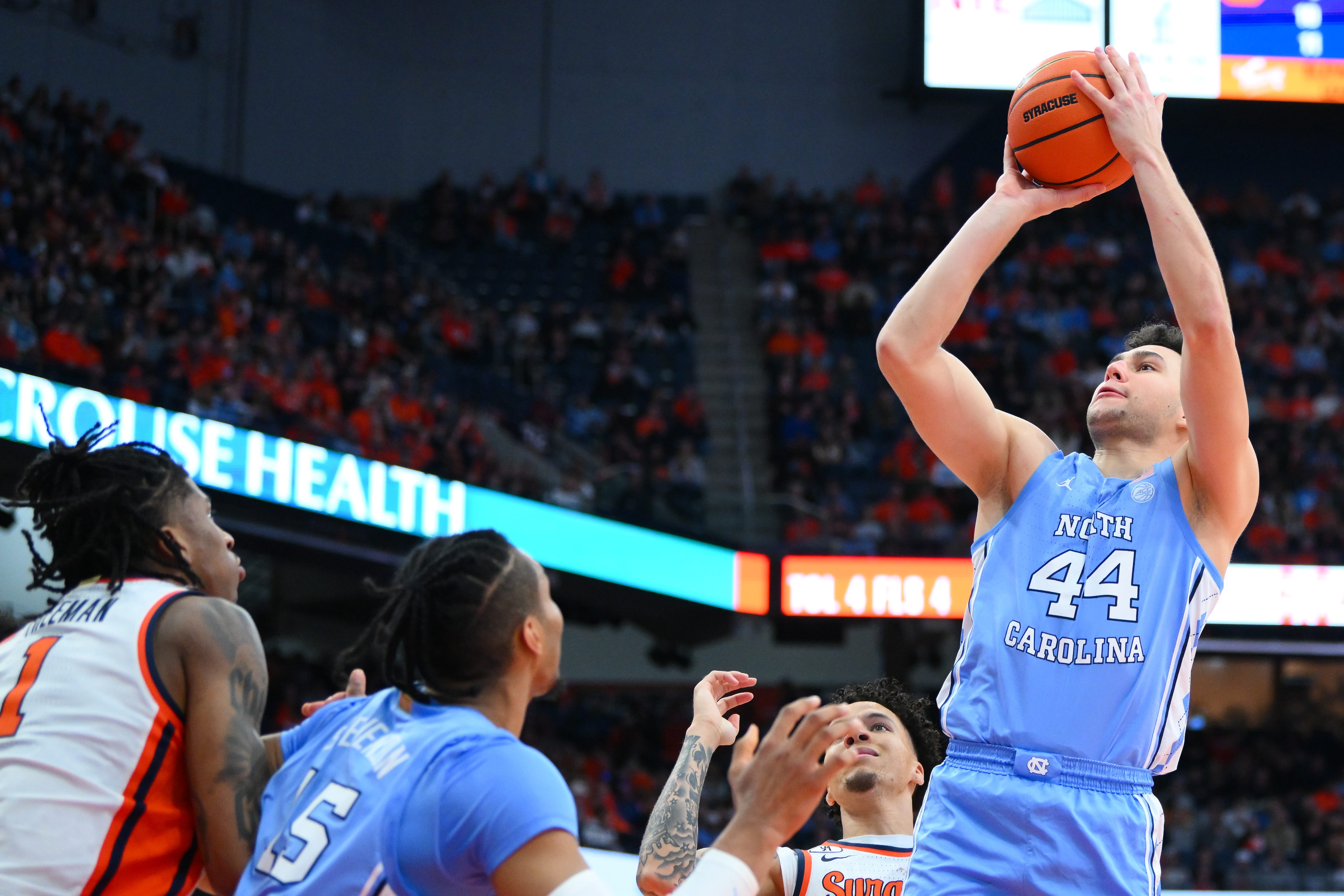 Feb 21, 2026; Syracuse, New York, USA; North Carolina Tar Heels guard Luka Bogavac (44) shoots during the first half against the Syracuse Orange at the JMA Wireless Dome. Mandatory Credit: Rich Barnes-Imagn Images