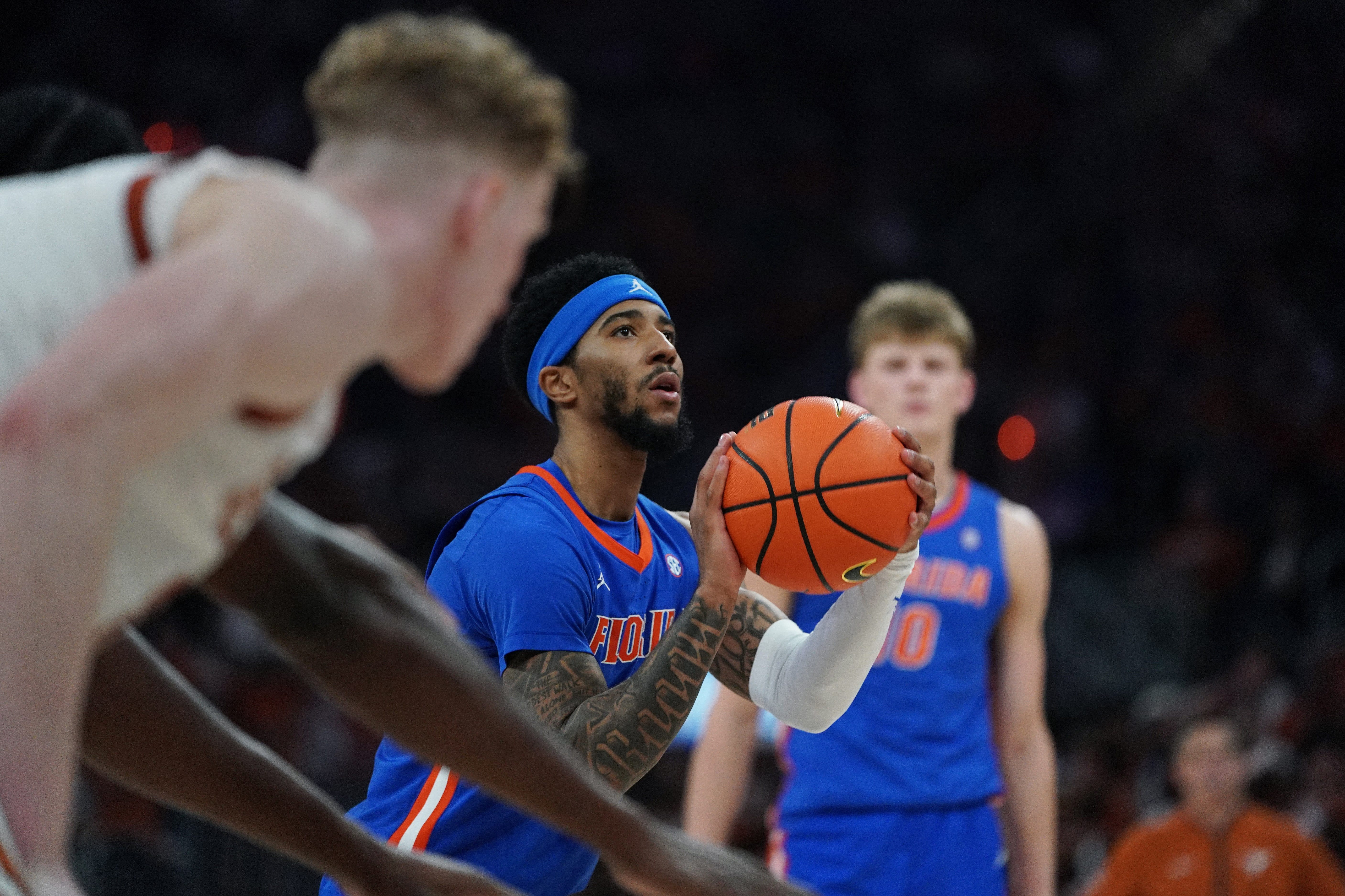 Feb 25, 2026; Austin, Texas, USA; Florida Gators center Rueben Chinyelu (9) shoots a free throw during the second half against the Texas Longhorns at Moody Center. Mandatory Credit: Dustin Safranek-Imagn Images
