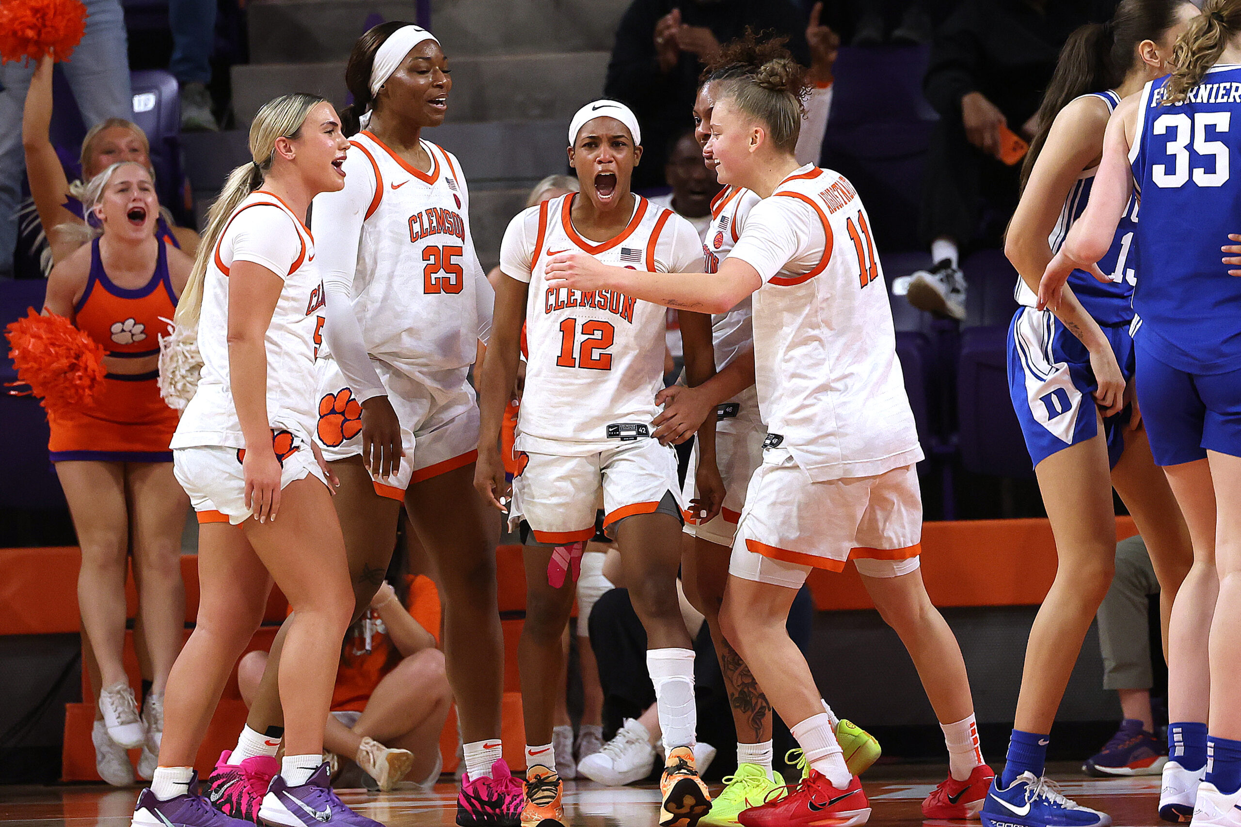 With clutch 3s and dominant defense, Clemson, Virginia and Iowa pull off top-10 upsets over Duke, Louisville and Michigan