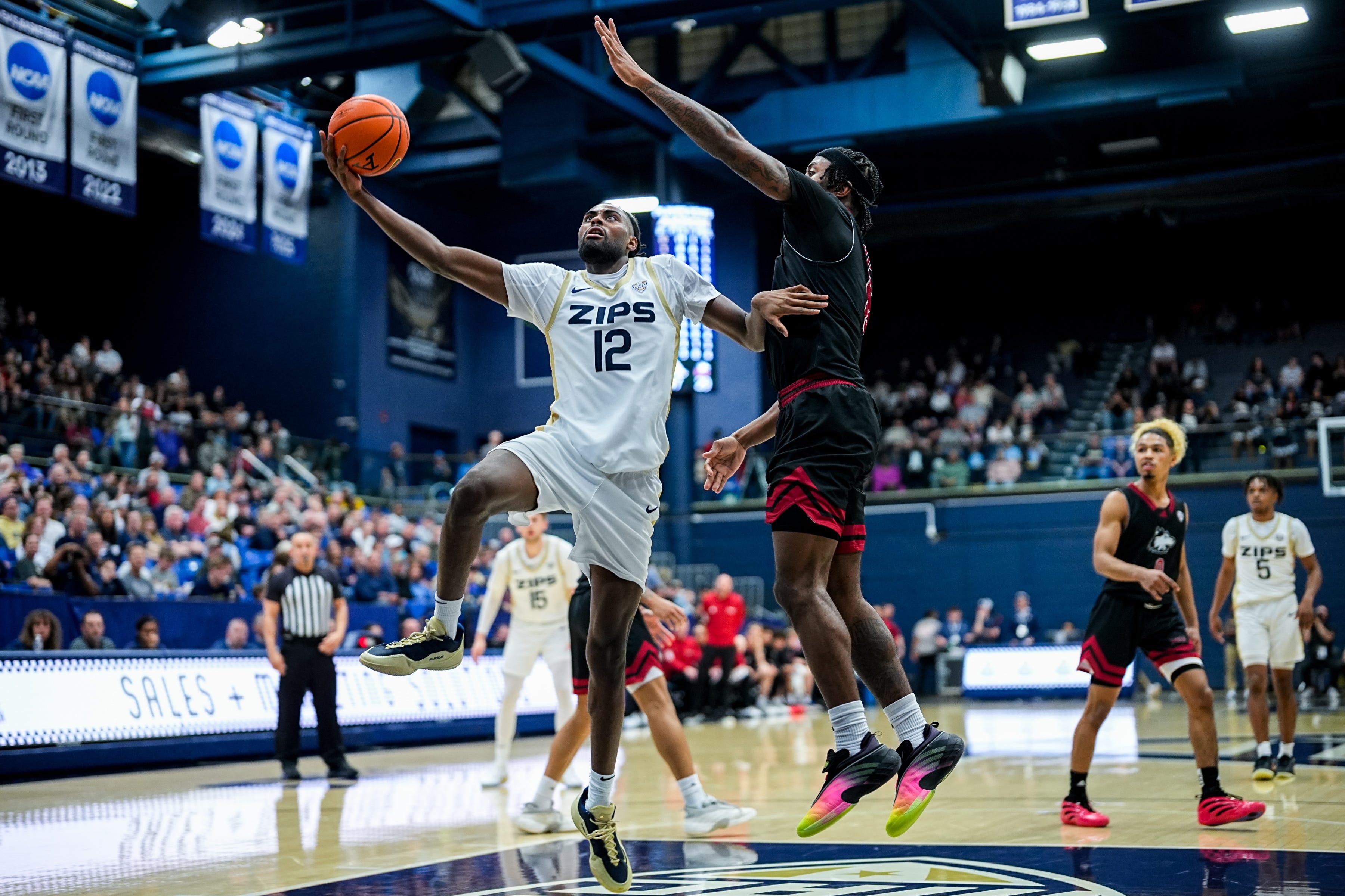 Akron Zips’ Evan Mahaffey (12) shoots during a Mid American Conference men’s basketball game against NIU, March 6, 2026, at James A Rhodes Arena in Akron, Ohio.