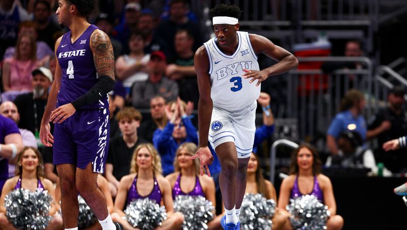BYU forward AJ Dybantsa (3) celebrates after making a 3-pointer during the first half of the game against the Kansas State Wildcats during the 2026 Phillips 66 Big 12 Men's Basketball Tournament at the T-Mobile Center in Kansas City, Missouri, on Tuesday, March 10, 2026.