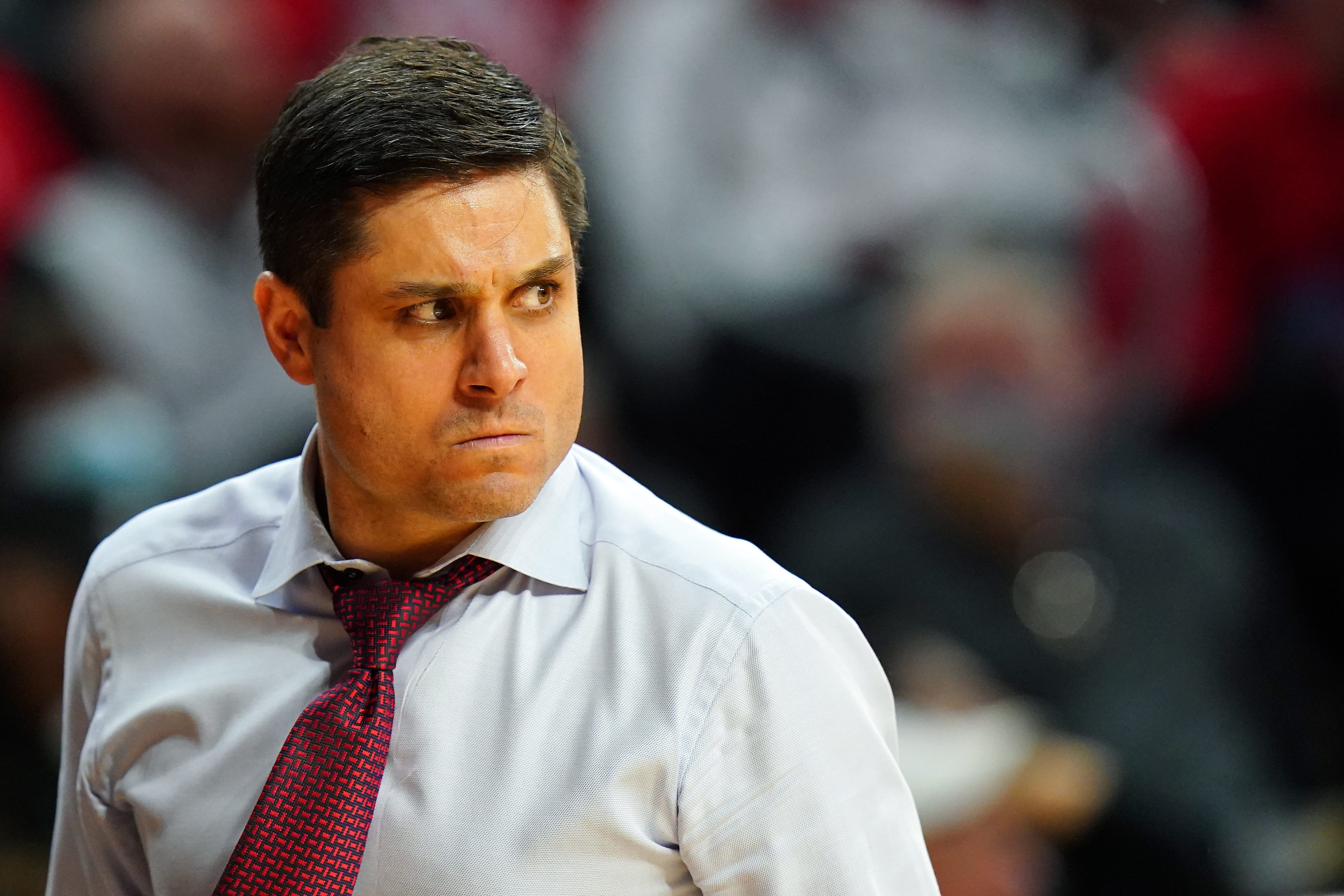 Cincinnati Bearcats head coach Wes Miller didn't care to lose, but lost some games against opponents he was favored to beat, like Monmouth in 2021.