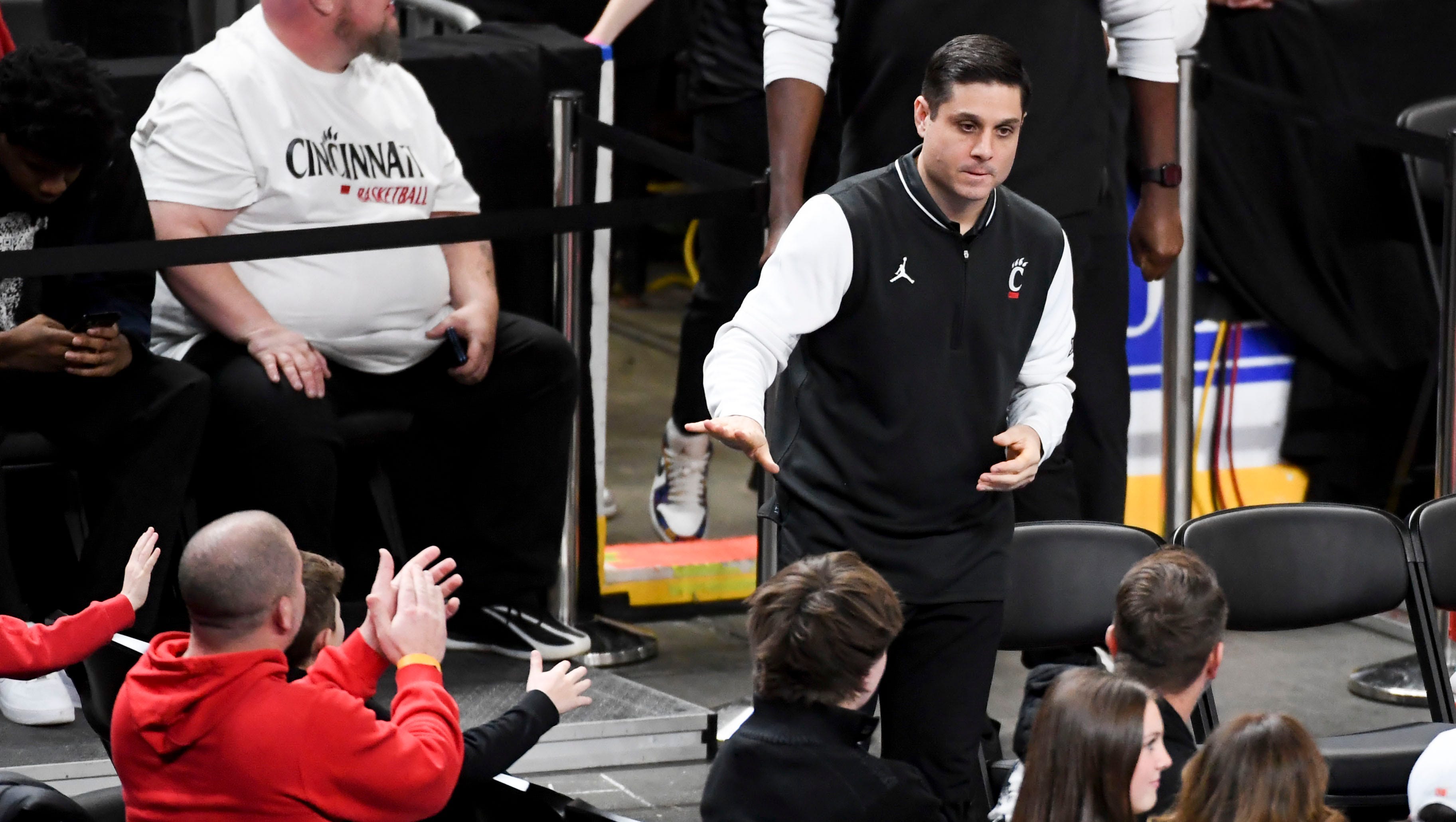 Cincinnati Bearcats head coach Wes Miller takes to the court Sunday, Dec. 21, 2025. UC started the game down 30-5 to Clemson in Greenville, South Carolina with Miller's former coach Roy Williams in attendance. The Bearcats clawed back and had a chance at a game-tying shot, but lost 68-65.