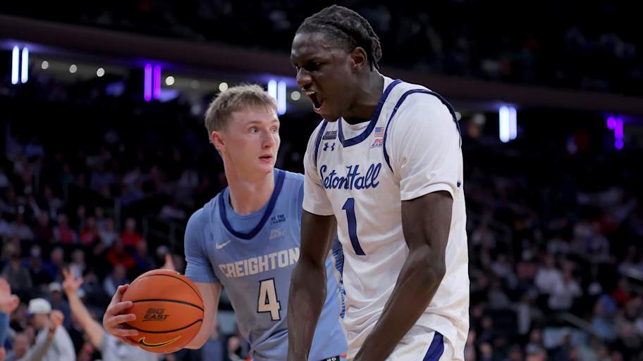 Seton Hall Pirates guard Jacob Dar (1) reacts after a dunk against Creighton Bluejays guard Josh Dix (4).
