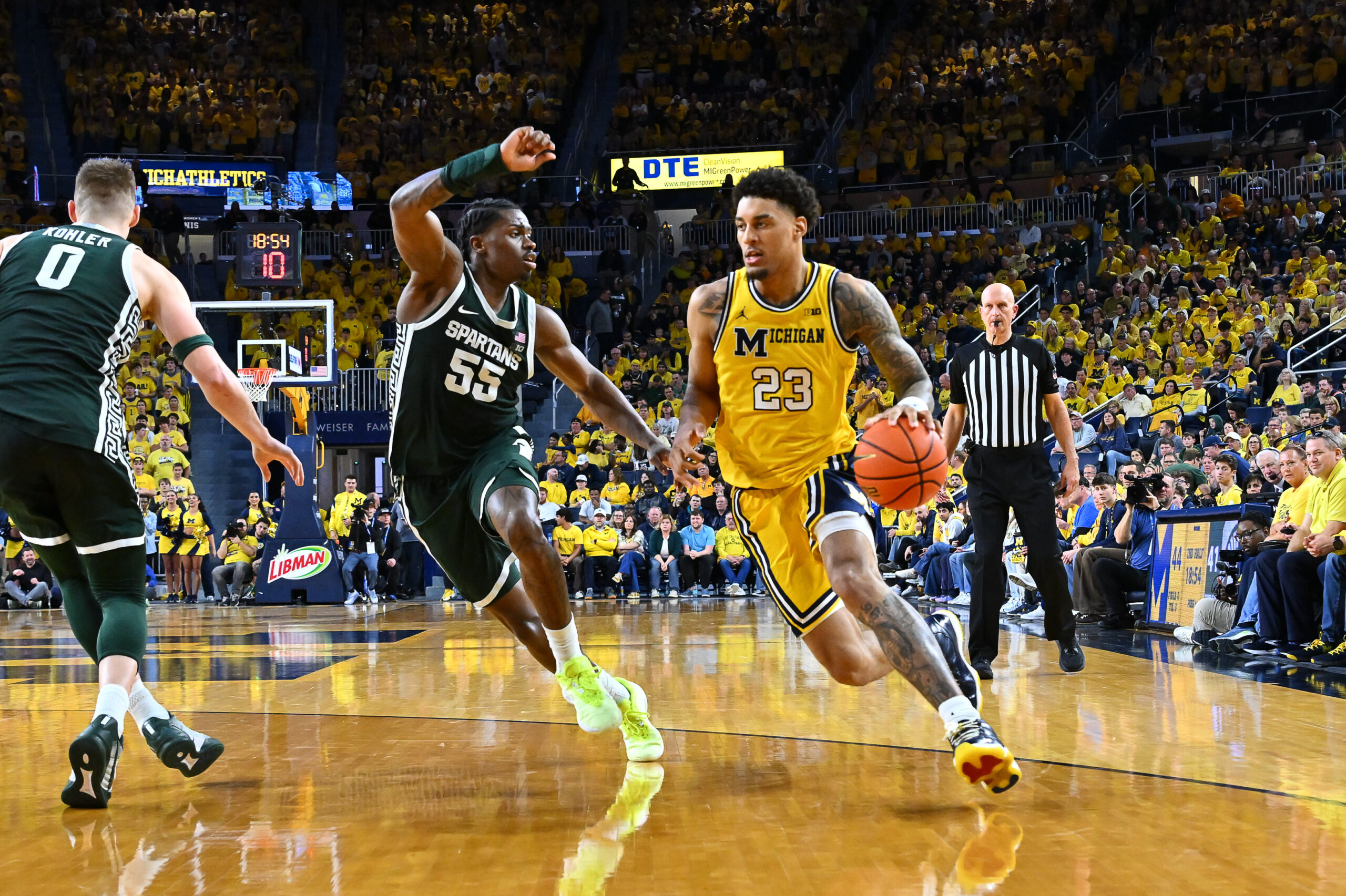 ESPN analyst predicts Michigan, MSU to play in National Championship