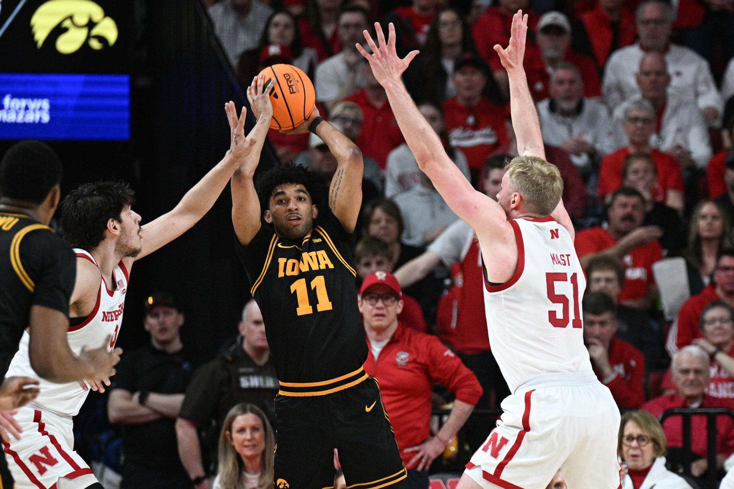 Hawks lose to Nebraska in overtime, 84-75