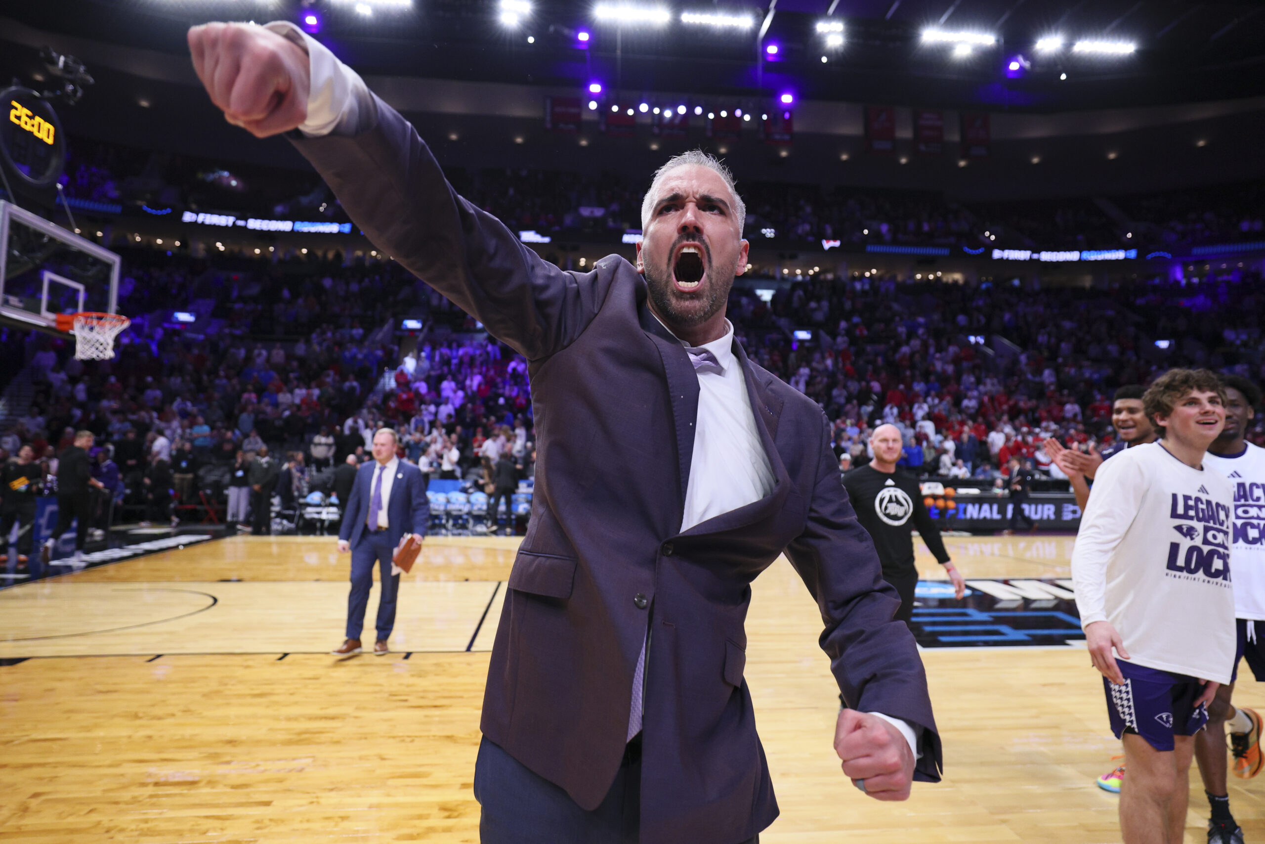 High Point coach Flynn Clayman rails against mid-major schedule disparity after NCAA tournament upset of Wisconsin: 'Nobody would play us'