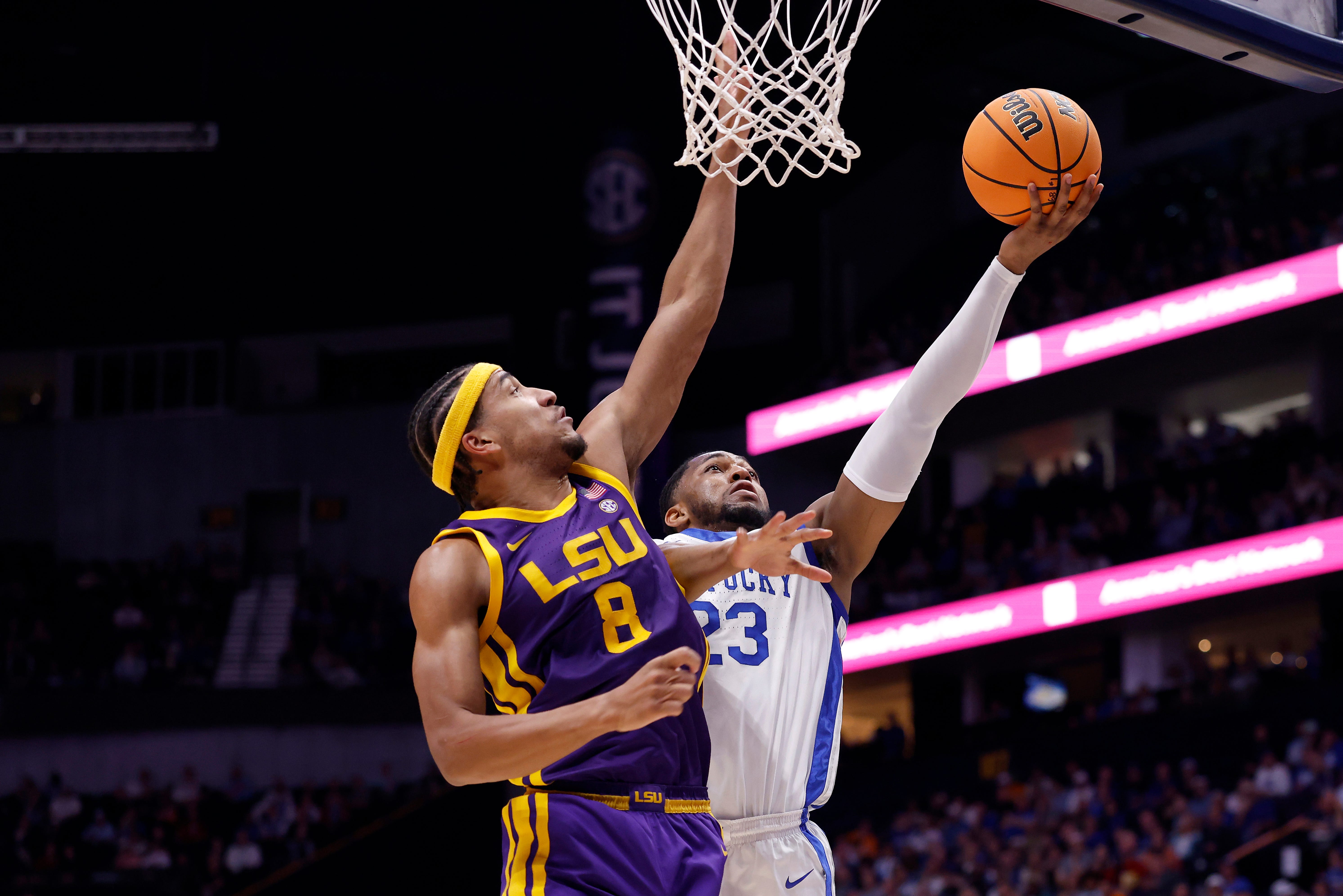 NASHVILLE, TENNESSEE - MARCH 11: Pablo Tamba #8 of the LSU Tigers blocks a shot by Mouhamed Dioubate #23 of the Kentucky Wildcats during the first half in the first round of the 2026 SEC Men's Basketball Tournament at Bridgestone Arena on March 11, 2026 in Nashville, Tennessee. (Photo by Johnnie Izquierdo/Getty Images)
