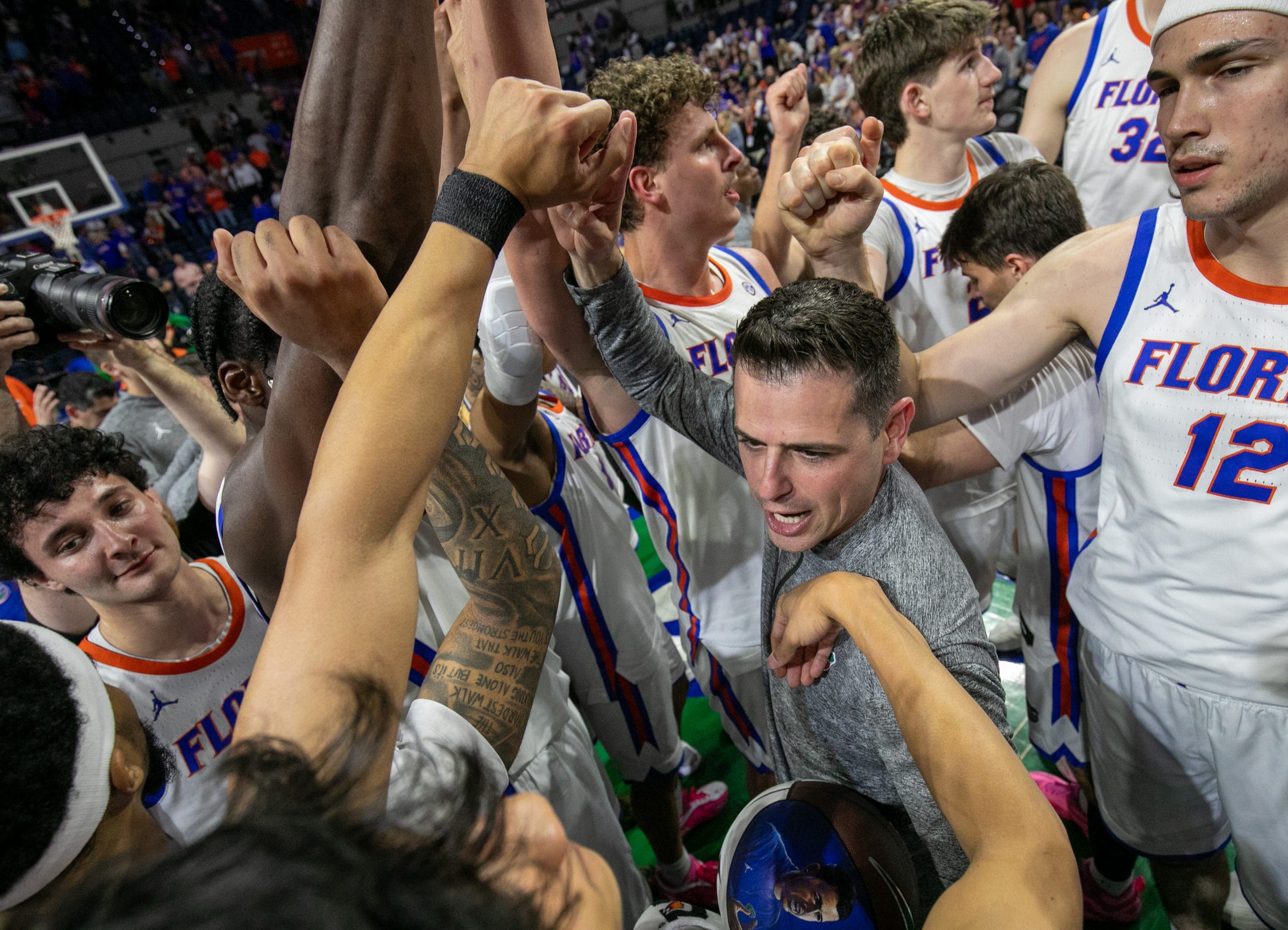 Florida coach Todd Golden celebrates his 100th win and beating Mississippi State 108-77 at O'Connell Center in Gainesville, FL on , March 3, 2026.