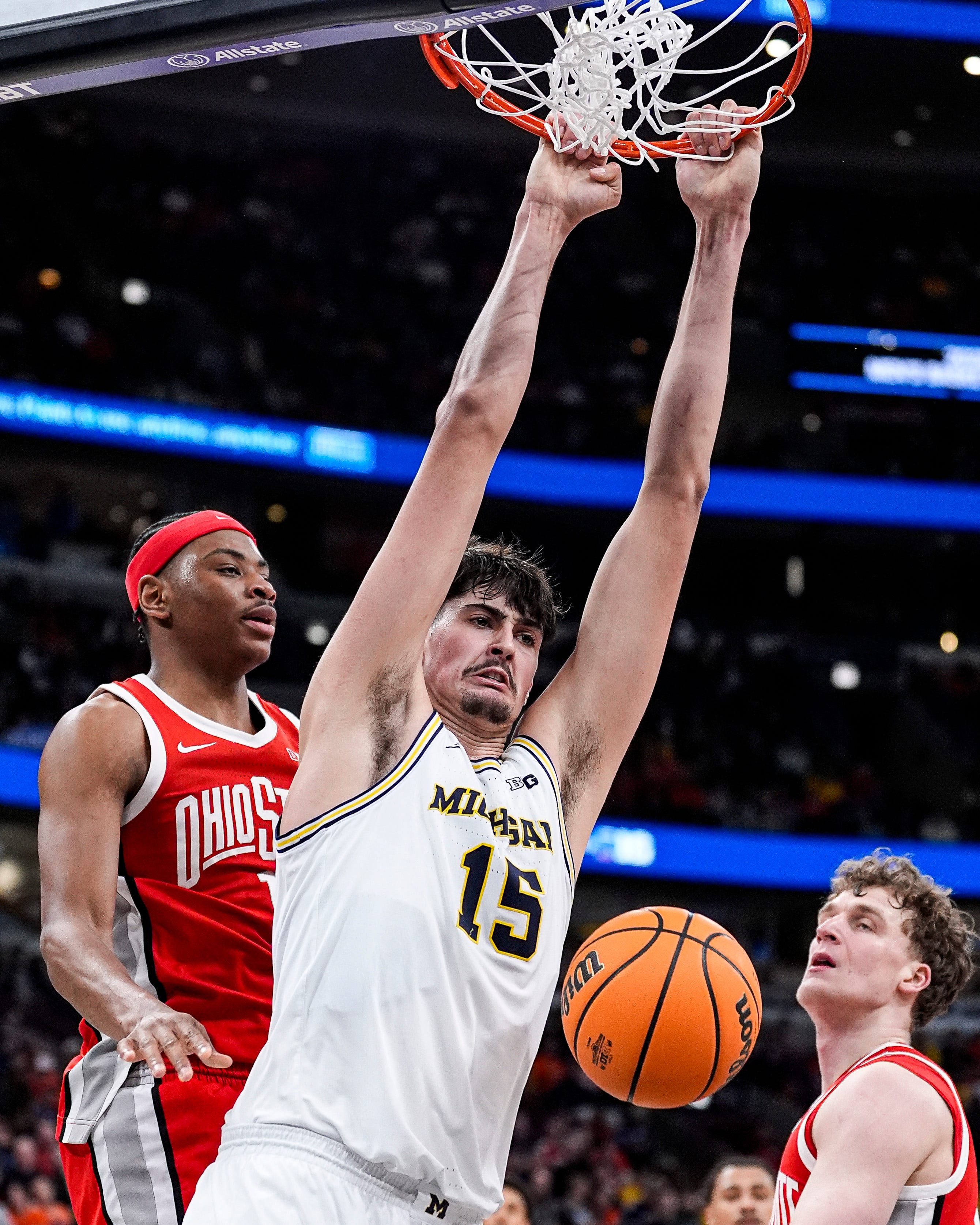 Michigan center Aday Mara (15) dunks against Ohio State during the second half of Big Ten tournament quarterfinal at United Center in Chicago on Friday, March 13, 2026.