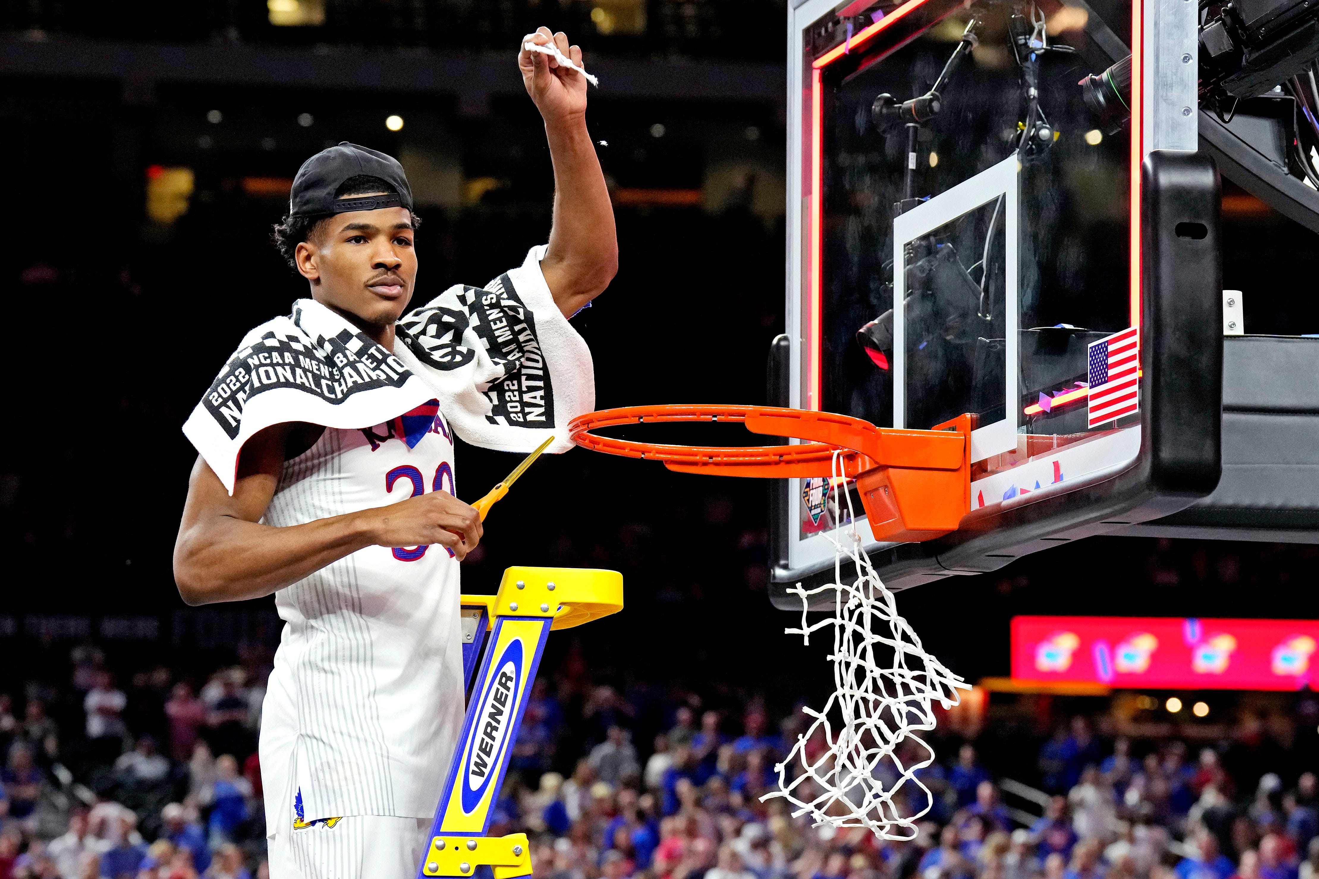 Kansas Jayhawks guard Ochai Agbaj celebrates.