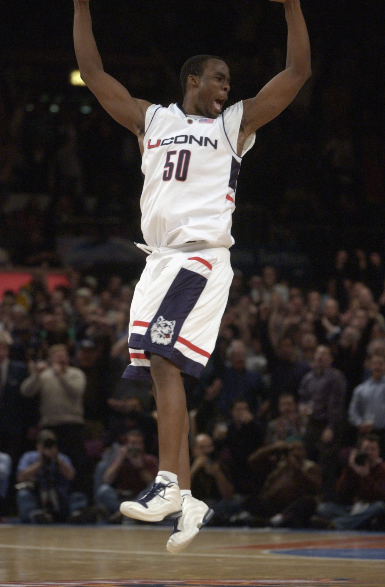 Emeka Okafor of the University of Connecticut Huskies celebrates.