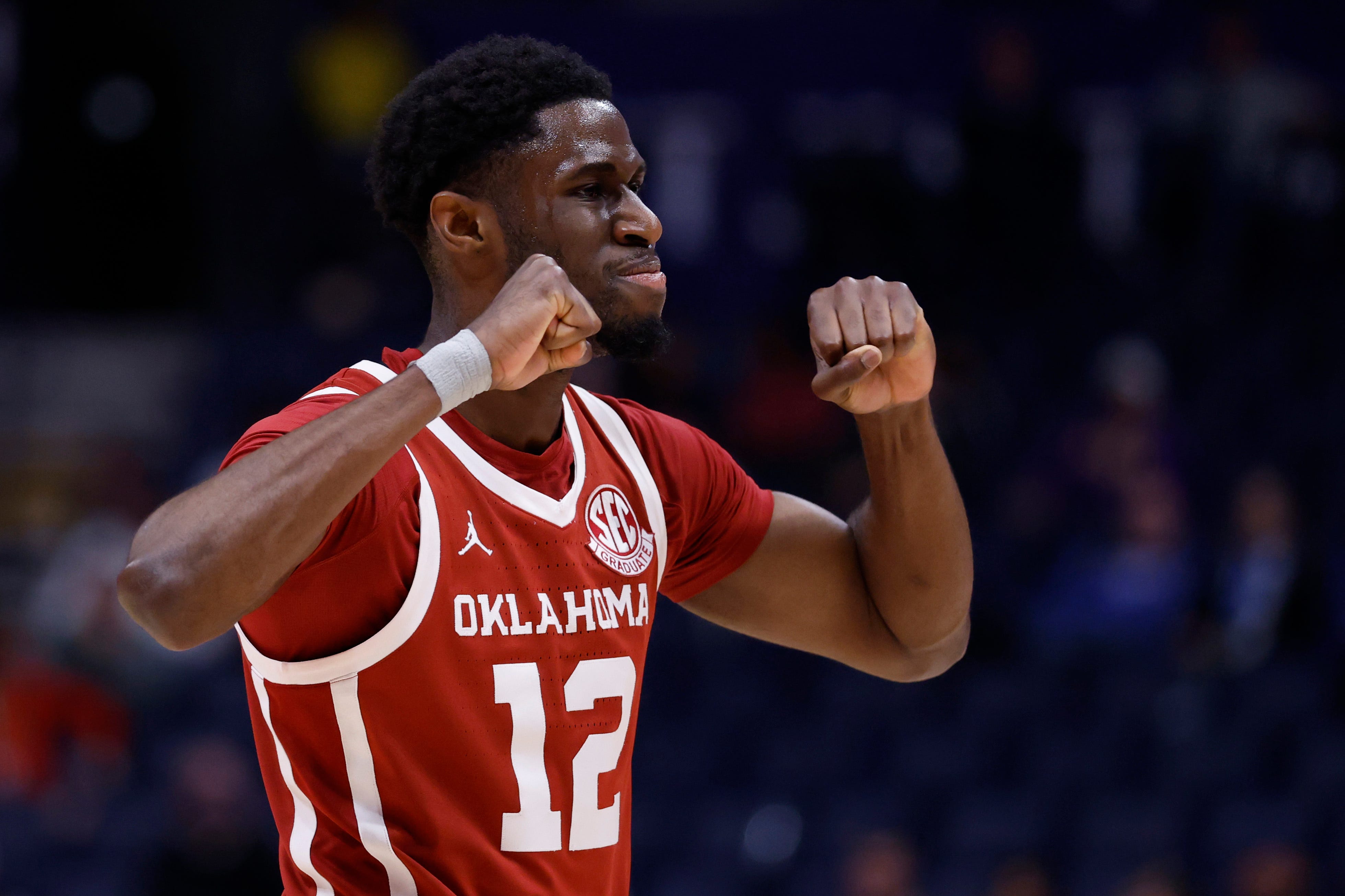 NASHVILLE, TENNESSEE - MARCH 12: Jadon Jones #12 of the Oklahoma Sooners reacts during the second half against the Texas A&M Aggies in the second round of the 2026 SEC Men's Basketball Tournament at Bridgestone Arena on March 12, 2026 in Nashville, Tennessee. (Photo by Johnnie Izquierdo/Getty Images)